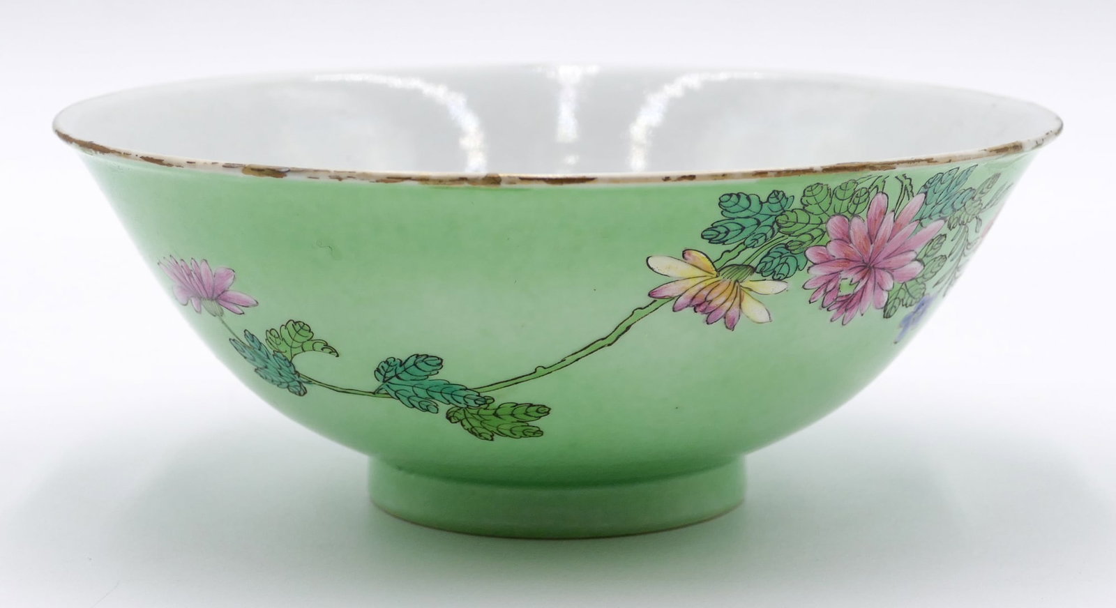 Fine Chinese Green Ground Famille Rose Bowl: Fine Chinese Green Ground Famille Rose Bowl 2.75 "x7 ". Famille rose flower motifs. Blue underglaze dynasty mark. Upper rim has several small old professional chip repairs and one very slight hairline