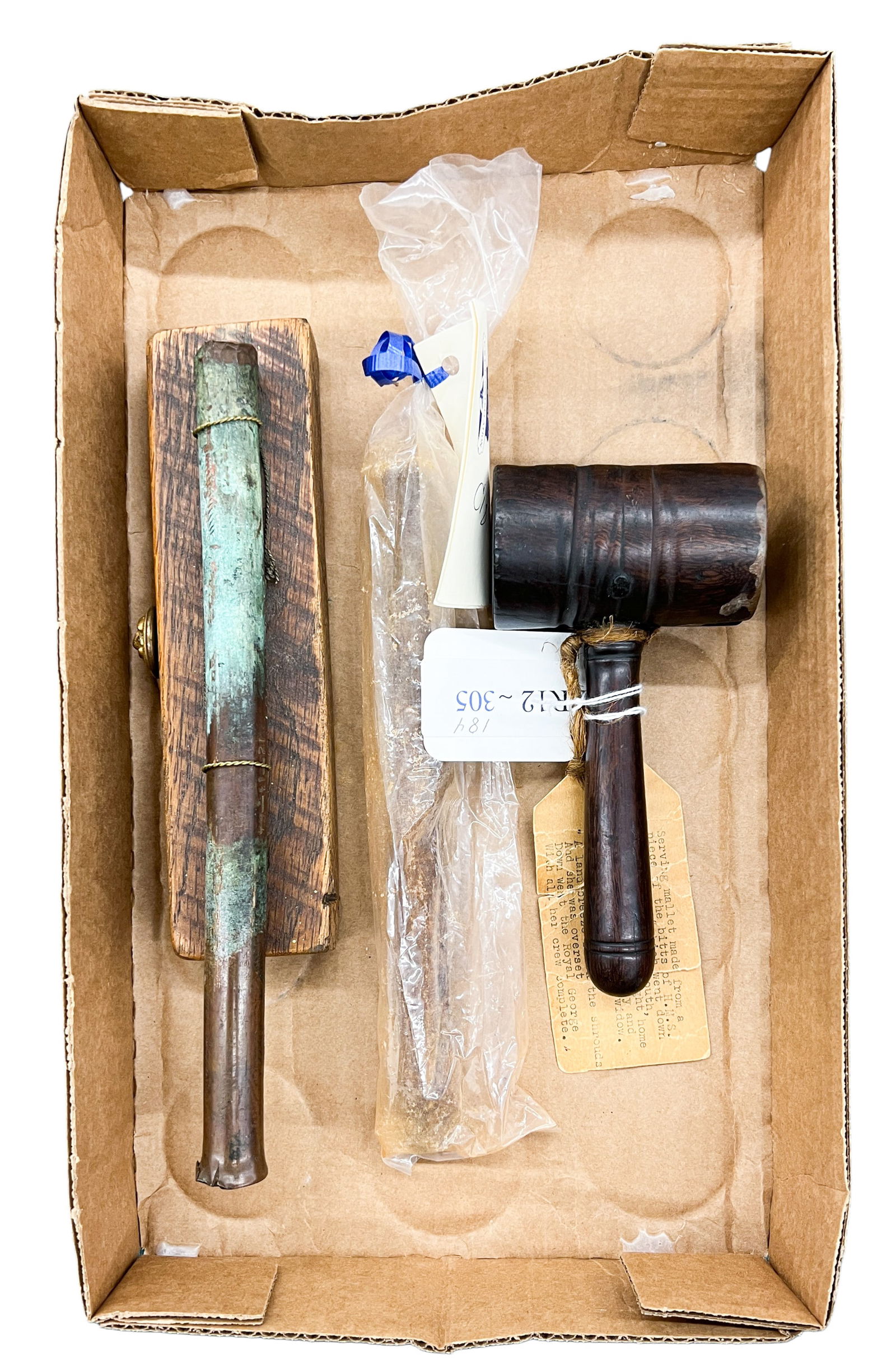Box 3pc Ship Spikes & Mallet: Box 3pc Ship Spikes & Mallet. Includes note stating that mallet was made from ship parts from the HMS Royal George