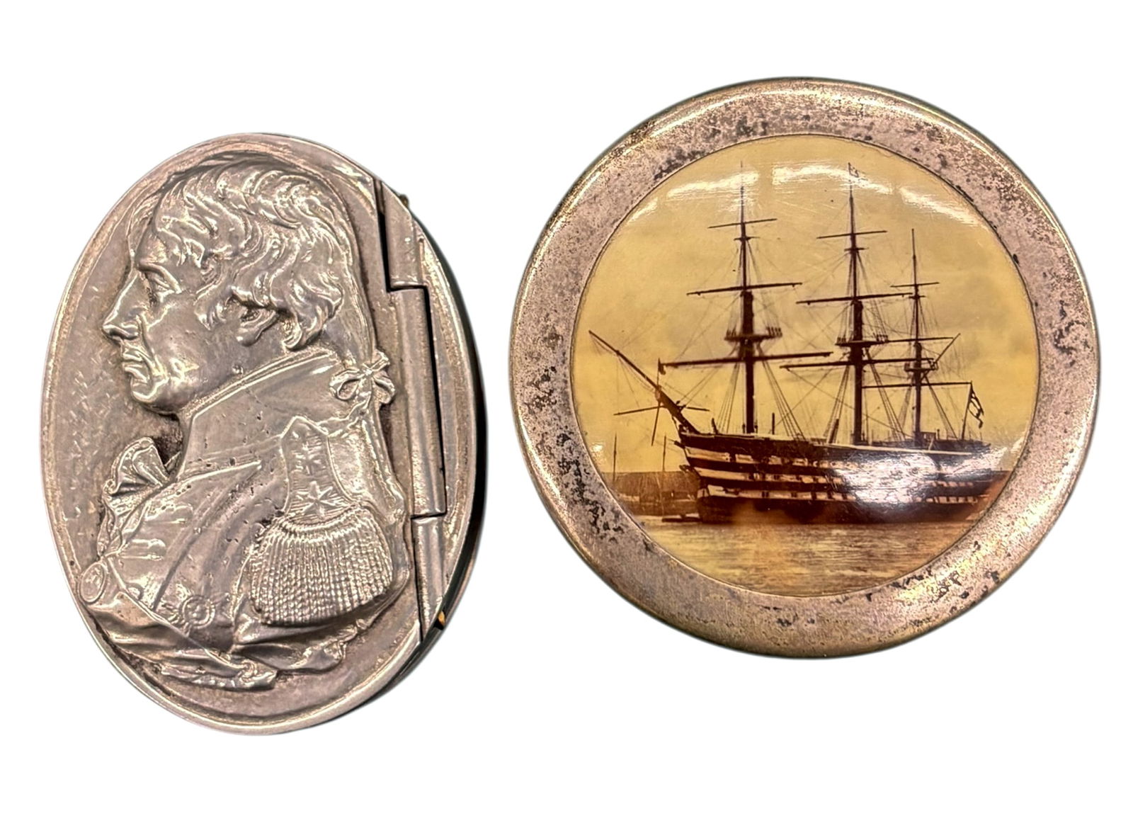 2pc Admiral Nelson Pewter and Silver Plated Snuff Boxes: 2pc Admiral Nelson Pewter and Silver Plated Snuff Boxes. 1"x2" largest
