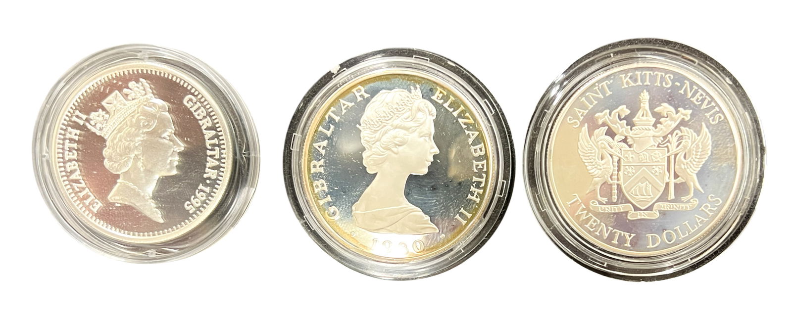 3pc Commemorative Admiral Nelson etc. Silver Proof Coins - 28.28 grams each: 3pc Commemorative Admiral Nelson etc. Silver Proof Coins - 28.28 grams each. Two Admiral Nelson £5 coins, one $20 Saint Kitts and Nevis coin.