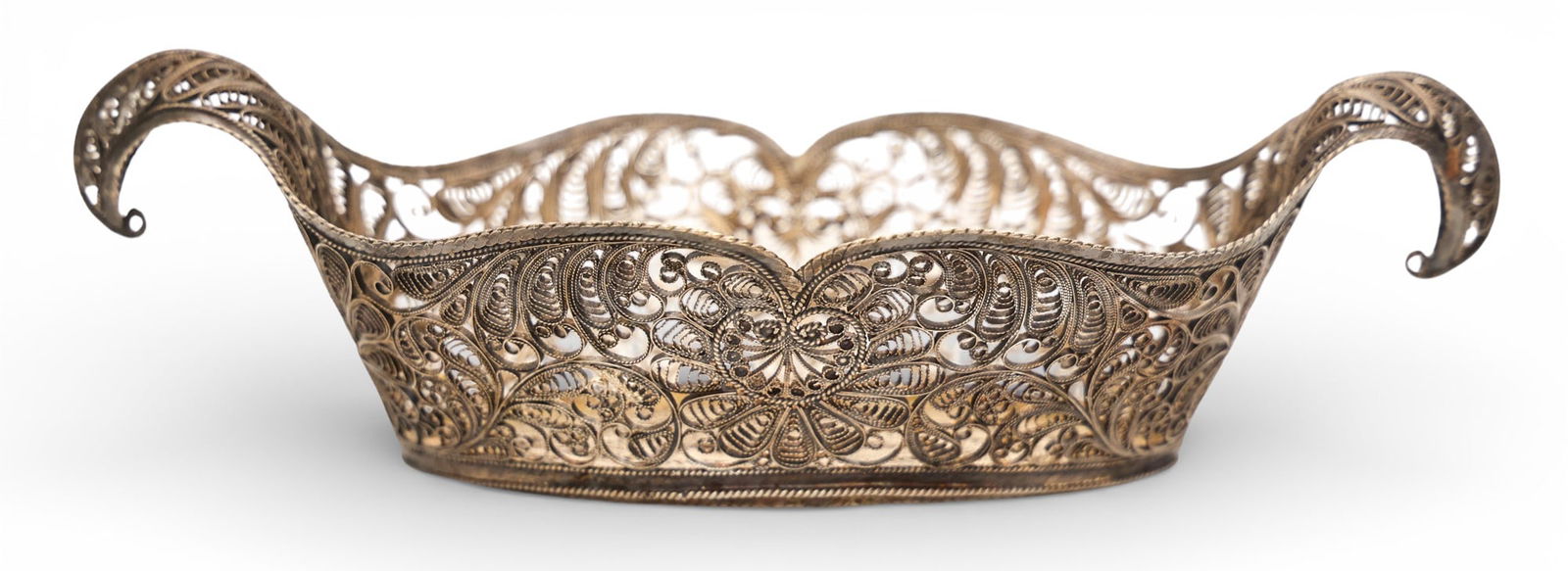 Antique Persian .800 Silver Filigree Basket: Antique Persian .800 Silver Filigree Basket 3"x10". Intricate scrolling filigree work with feather motifs. Unmarked. Excellent condition. It weighs 266 grams total.
