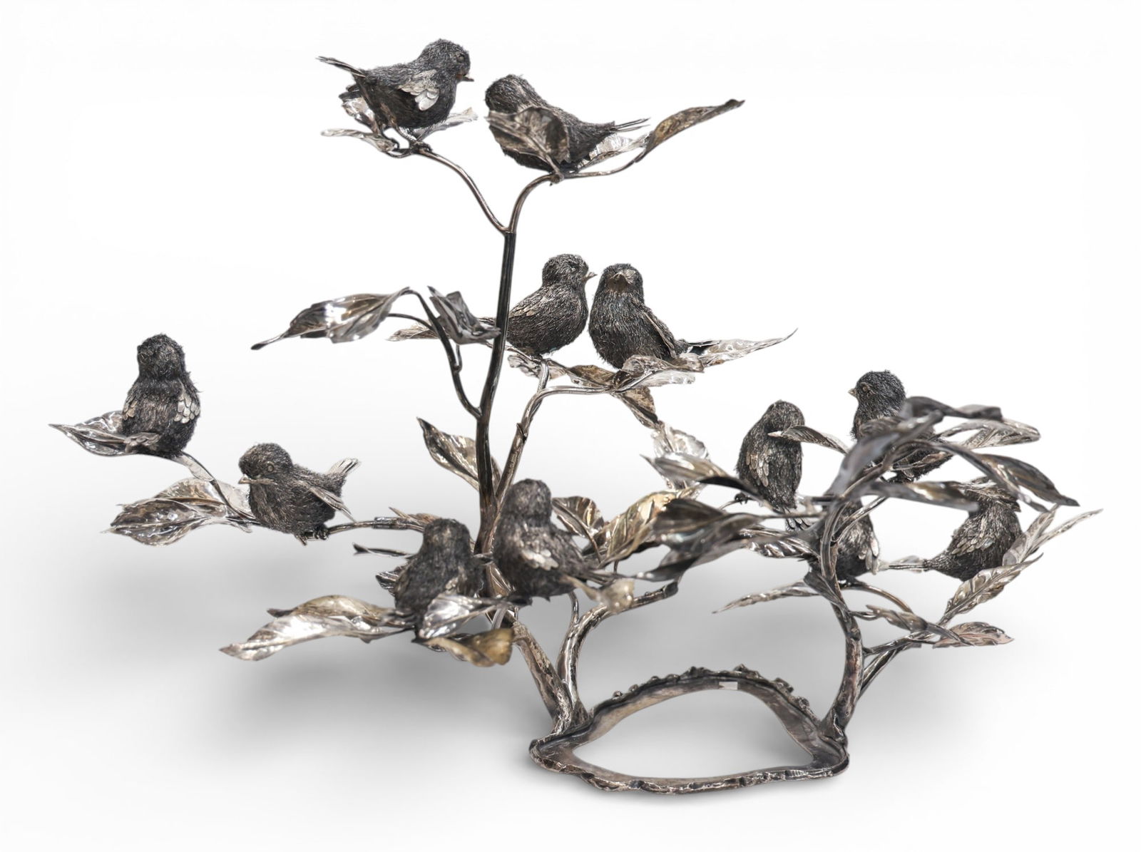 Impressive Mario Buccellati Italian Sterling Twelve-Bird Centerpiece: Impressive Mario Buccellati Italian Sterling Twelve-Bird Centerpiece 13"x21"x14". Exceptional eight-part custom made silver sculpture comprising of twelve sparrow birds on branches with leaves. Marked