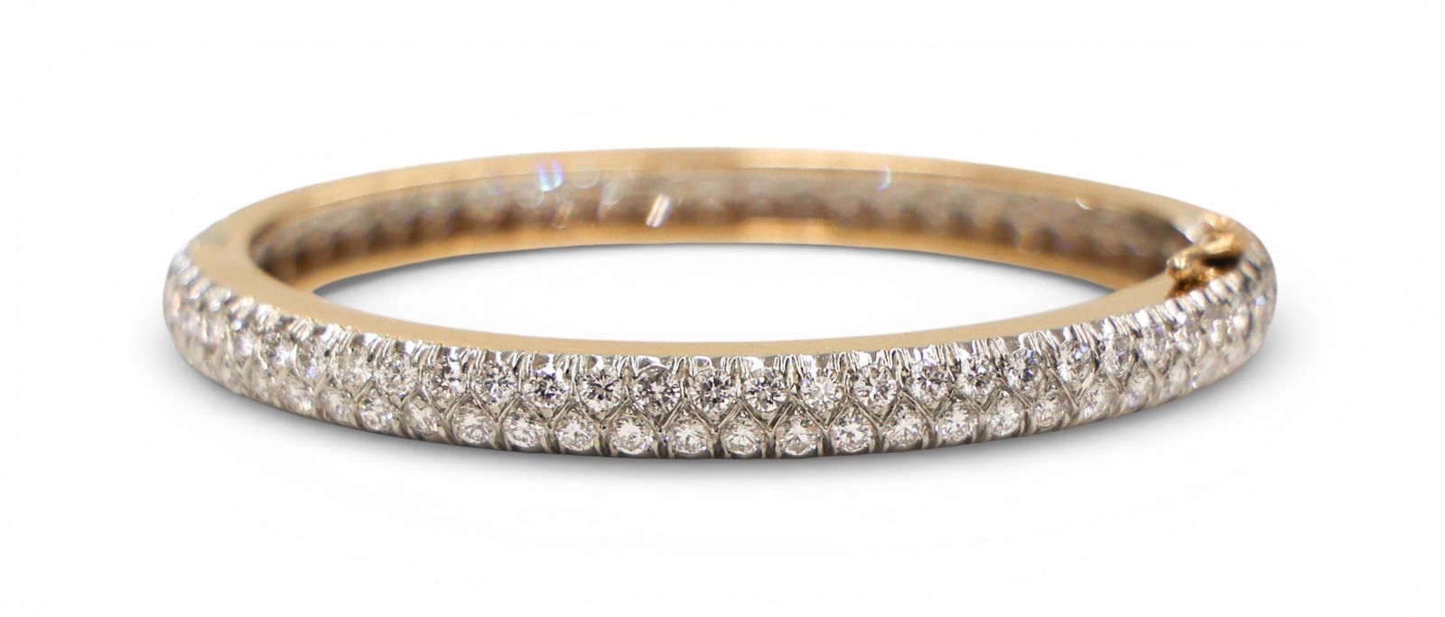 Ladies 7.28ctw Diamond 14k Hinged Bangle Bracelet: Ladies 7.28ctw Diamond 14k Hinged Bangle Bracelet Fits 6.5". Rhodium-topped 14k bangle mounted with (124) round brilliang cut diamonds. Marked 14K with illegible maker's cipher. Overall excellent cond