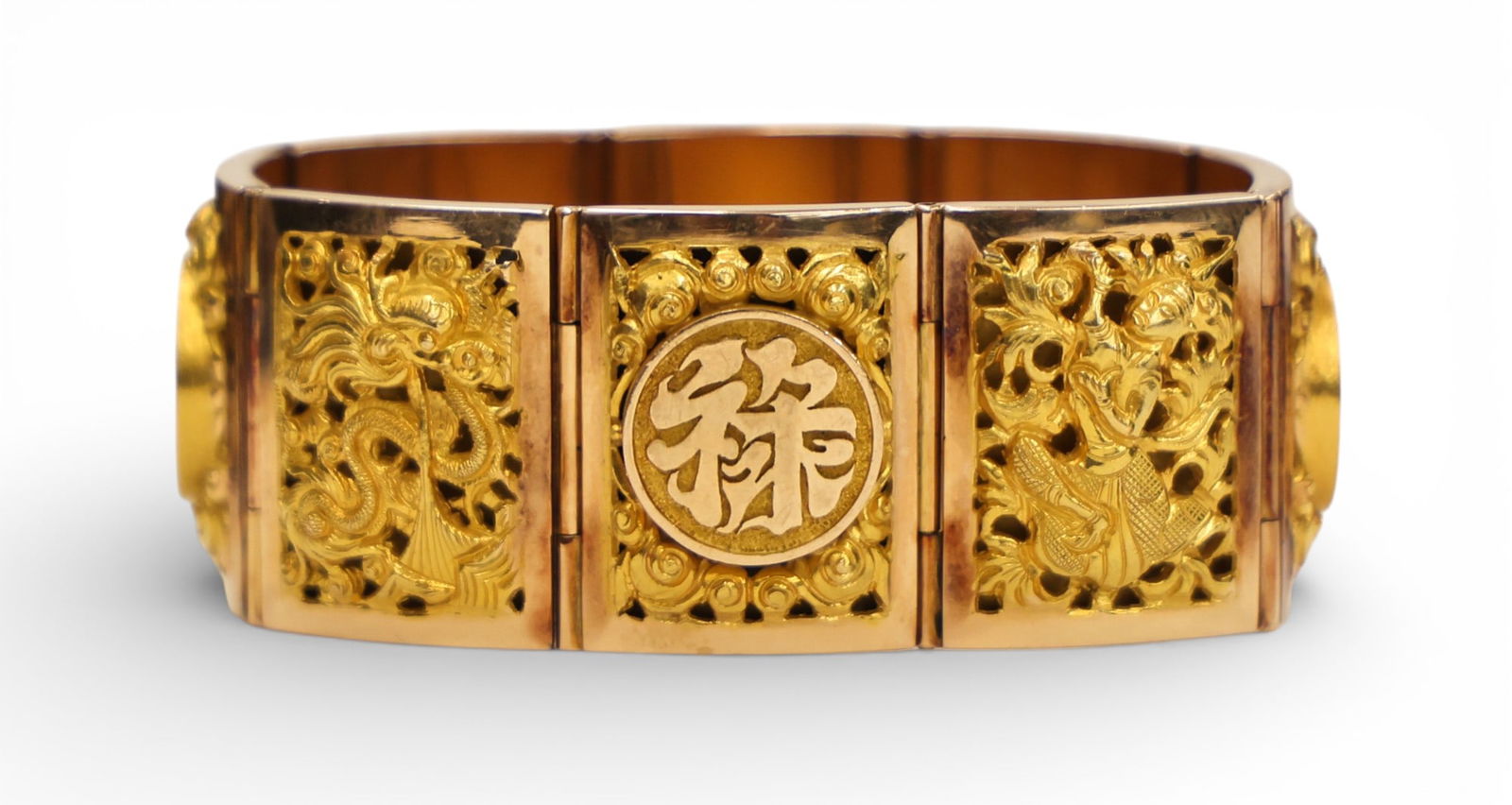Ornate Laotian 18k Four Seasons Pierced Link Bracelet: Ornate Laotian 18k Four Seasons Pierced Link Bracelet 6.5". Includes eight hand chased and pierced links with medallions 26mm thick. Marked 18K with 22k gold decorated applied panels. Purchased in Lao