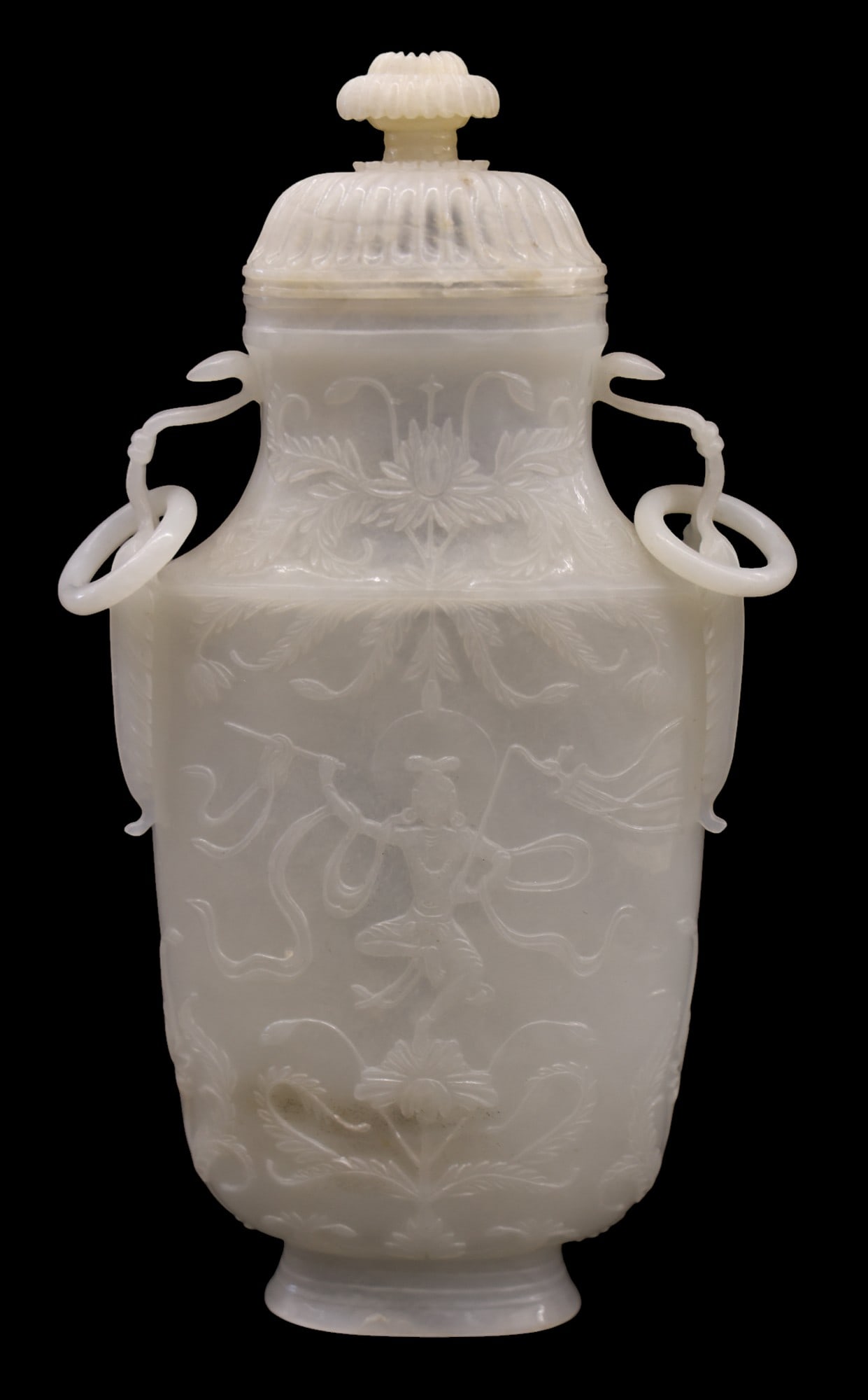 Fine Chinese Mughal Style Translucent Jade Covered Vase: Fine Chinese Mughal Style Translucent Jade Covered Vase 8"x4.5". Exceptionally carved very thin walled ring handled form. Well hollowed interior and base. Relief carved with bodhisattva and scrolling