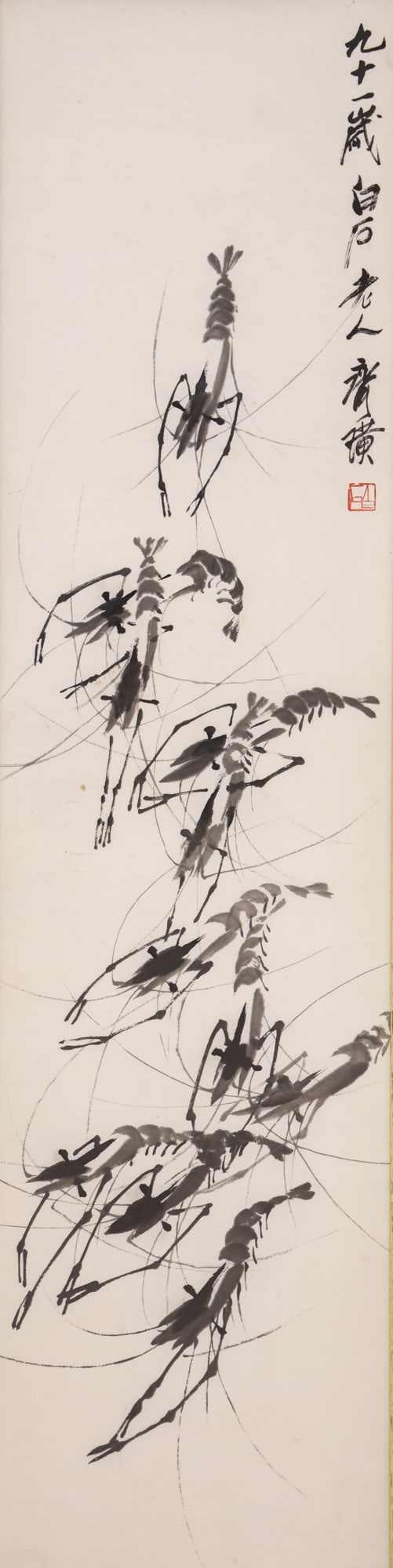 Qi Baishi "Shrimp" 1955 Ink on Paper Chinese Painting: Qi Baishi (1864-1957 Chinese) "Shrimp" 1955 Ink on Paper 54"x13.5" Image. Signed upper right with artist's red seal, stating the work was created when the artist was 91 years old. Original framing 58"