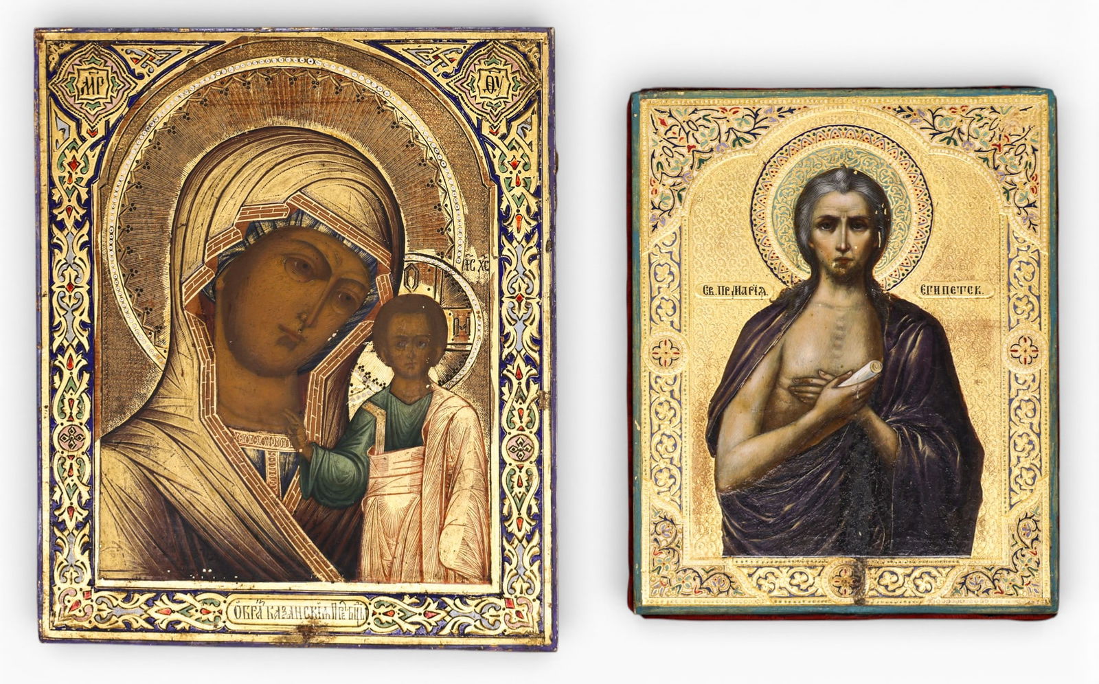 2pc Ornate Russian Gilt Wood Painted Religious Icons: 2pc Ornate Russian Gilt Wood Painted Religious Icons 10.5"x8.75" and 9"x7". Includes finely painted and gilt Kazan Mother of God and Saint Mary of Egypt Orthodox images. Some scattered minor loss to g
