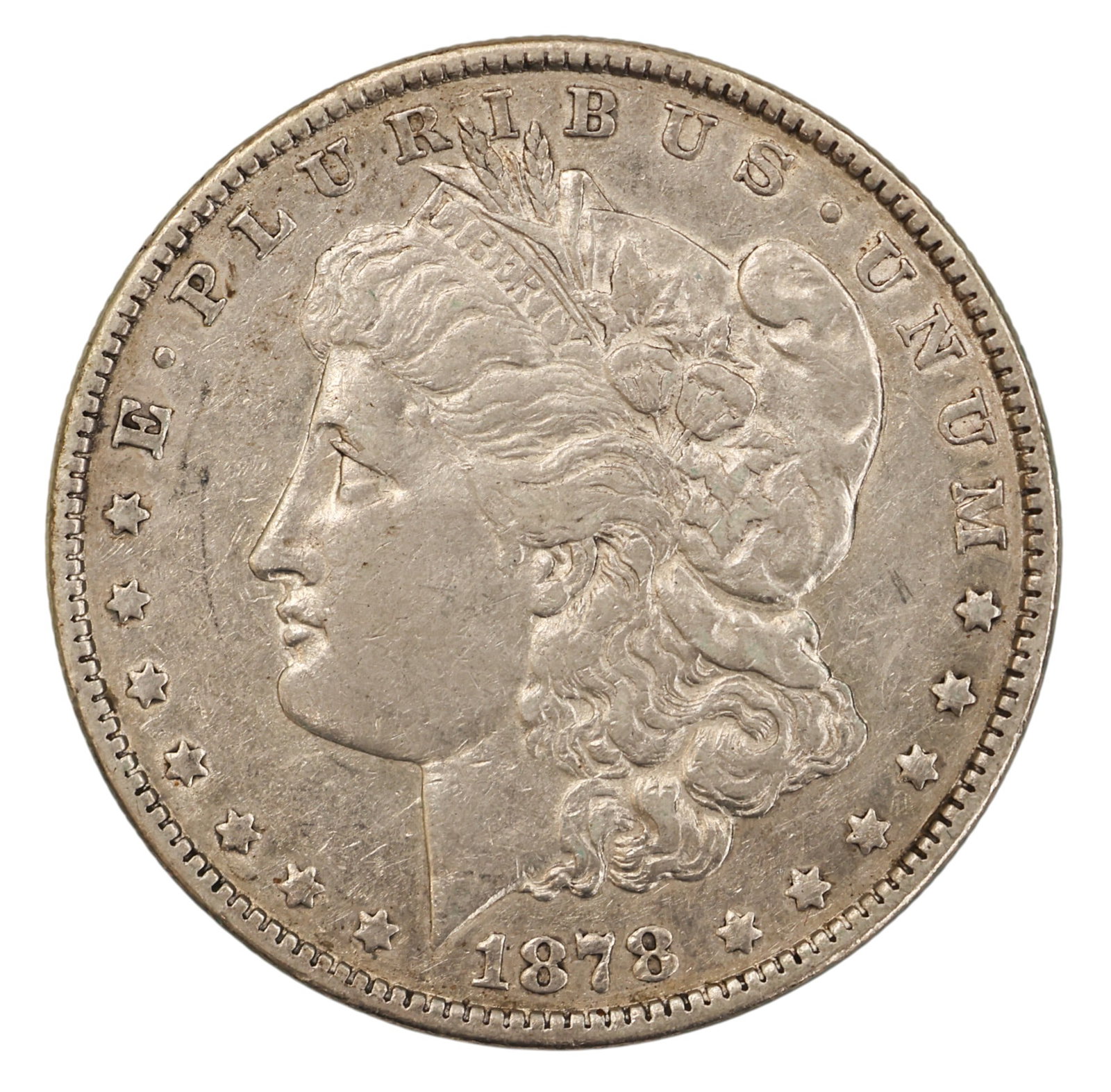 1878 US Morgan Silver Dollar 7 Feathers 2nd Reverse: 1878 US Morgan Silver Dollar 7 Feathers 2nd Reverse. MS-64 condition per consignor notes.