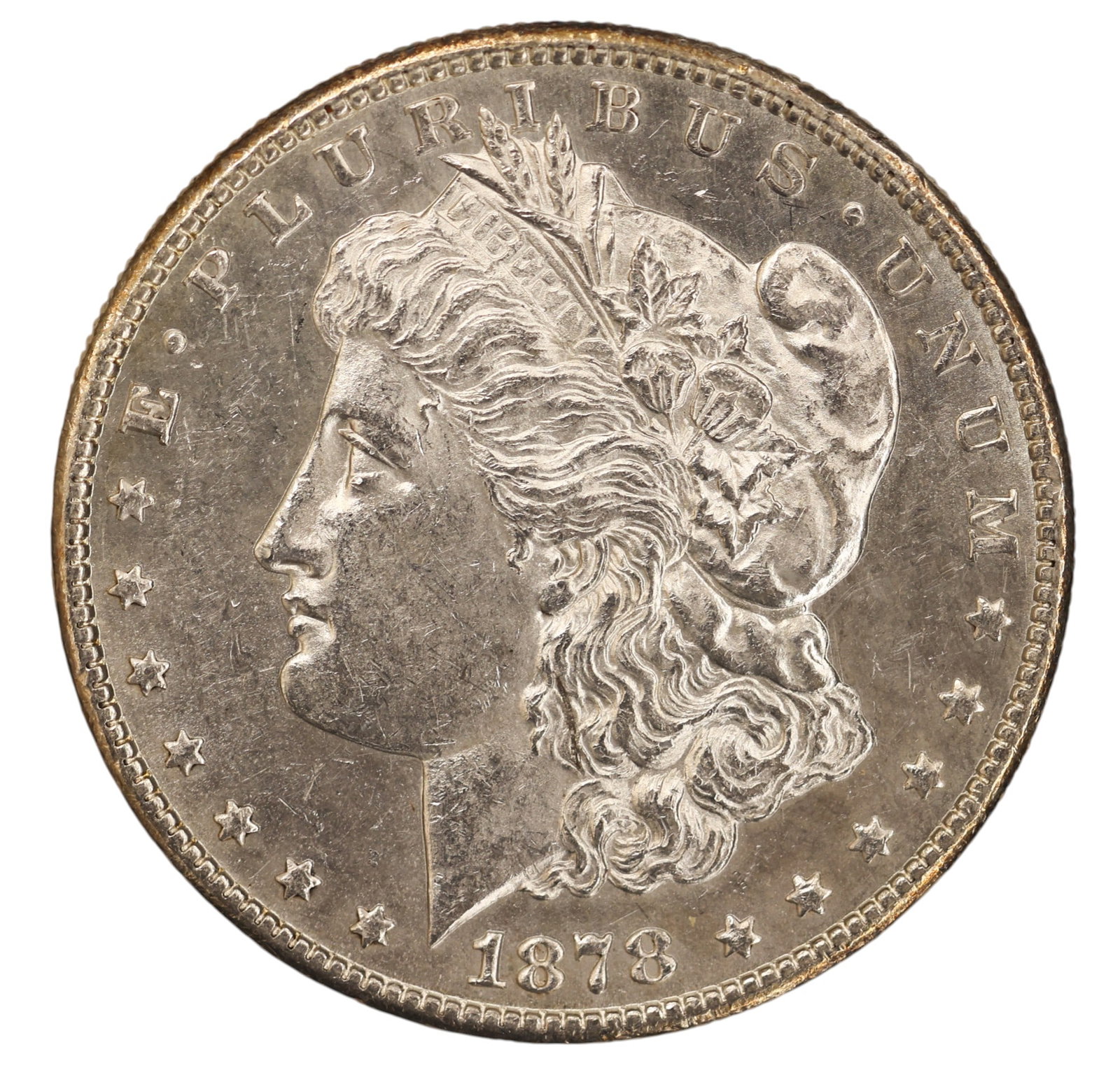 1878-S US Morgan Silver Dollar: 1878-S US Morgan Silver Dollar. MS-63 condition per consignor notes.
