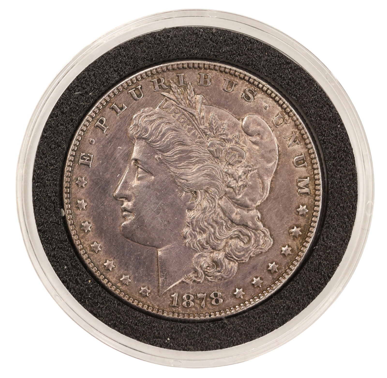 1878 US Morgan Silver Dollar 7 Feathers 2nd Reverse: 1878 US Morgan Silver Dollar 7 Feathers 2nd Reverse. MS-60 condition per consignor notes.