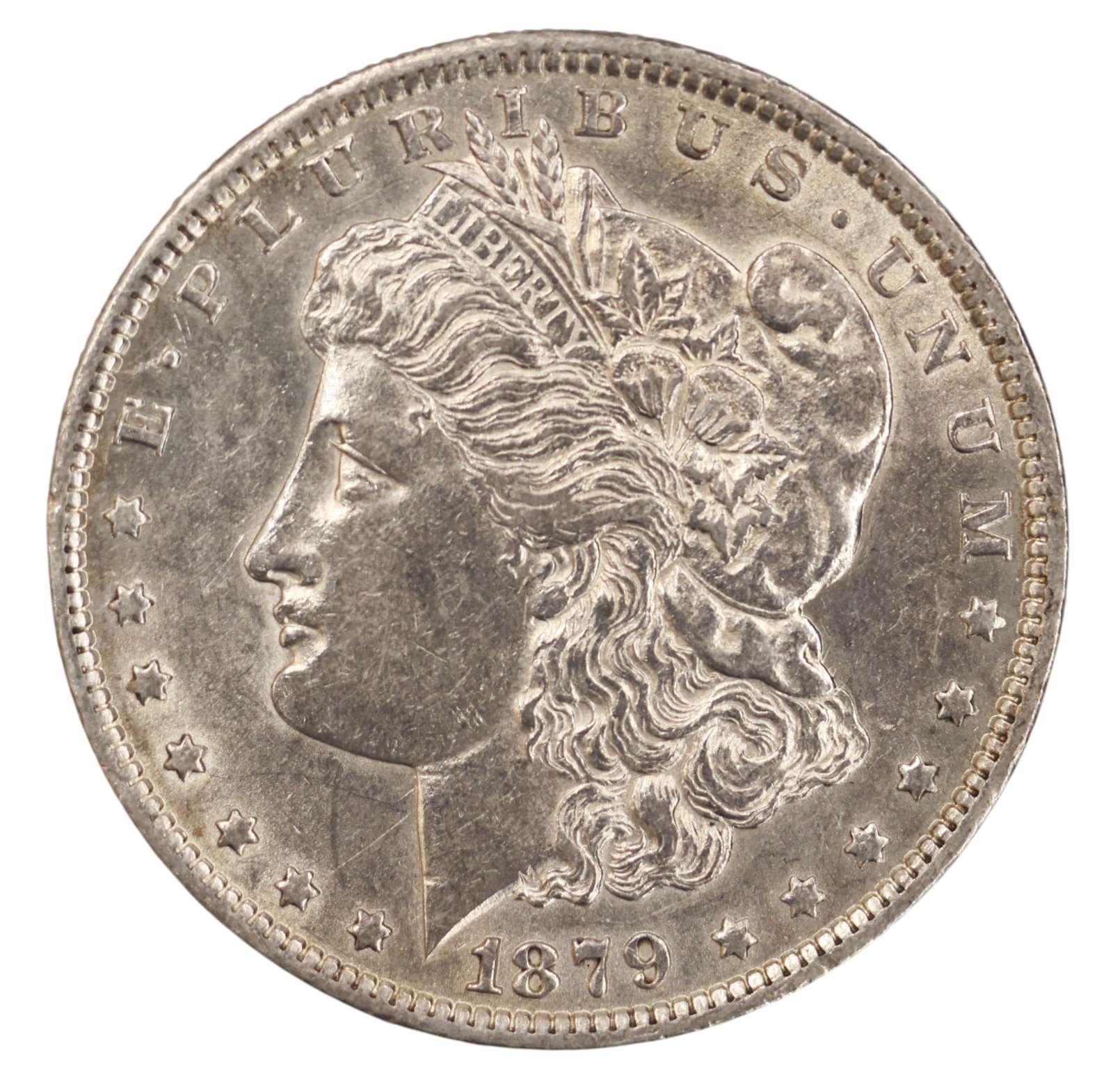 1879-O US Morgan Silver Dollar: 1879-O US Morgan Silver Dollar. MS-63 condition per consignor notes.