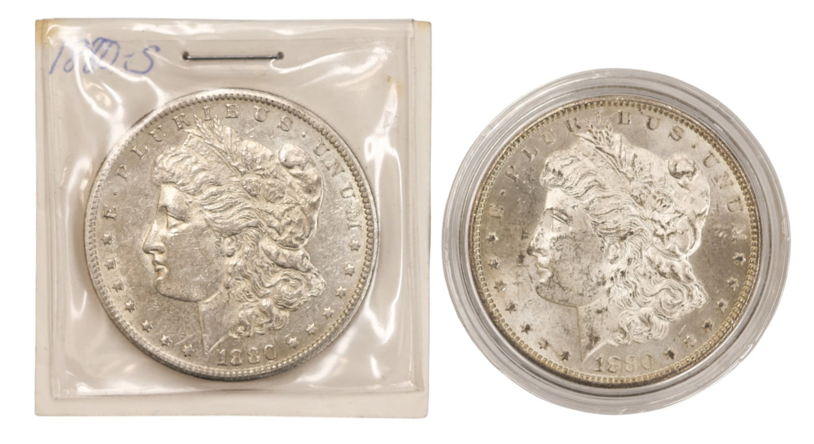 2pc 1880-S US Morgan Silver Dollars: 2pc 1880-S US Morgan Silver Dollars. MS-60 and MS-63 condition per consignor notes.