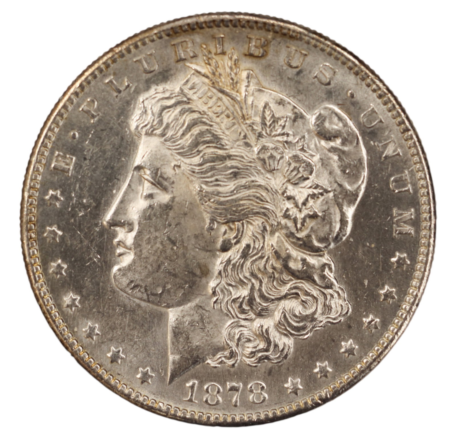 1878-S US Morgan Silver Dollar: 1878-S US Morgan Silver Dollar. MS-60 condition per consignor notes.