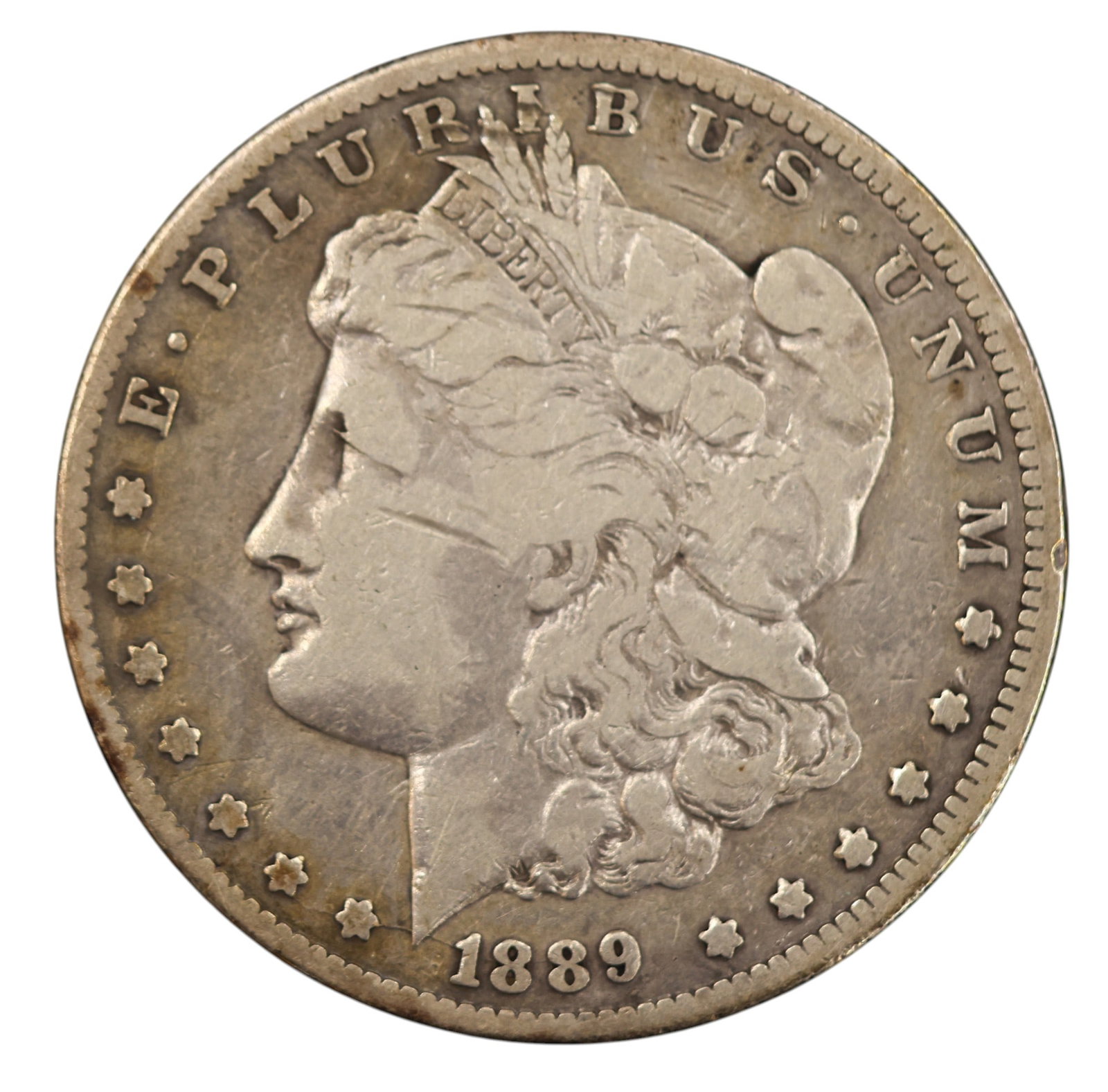 1889-CC US Morgan Silver Dollar Carson City: 1889-CC US Morgan Silver Dollar Carson City. AU-50 condition per consignor notes.