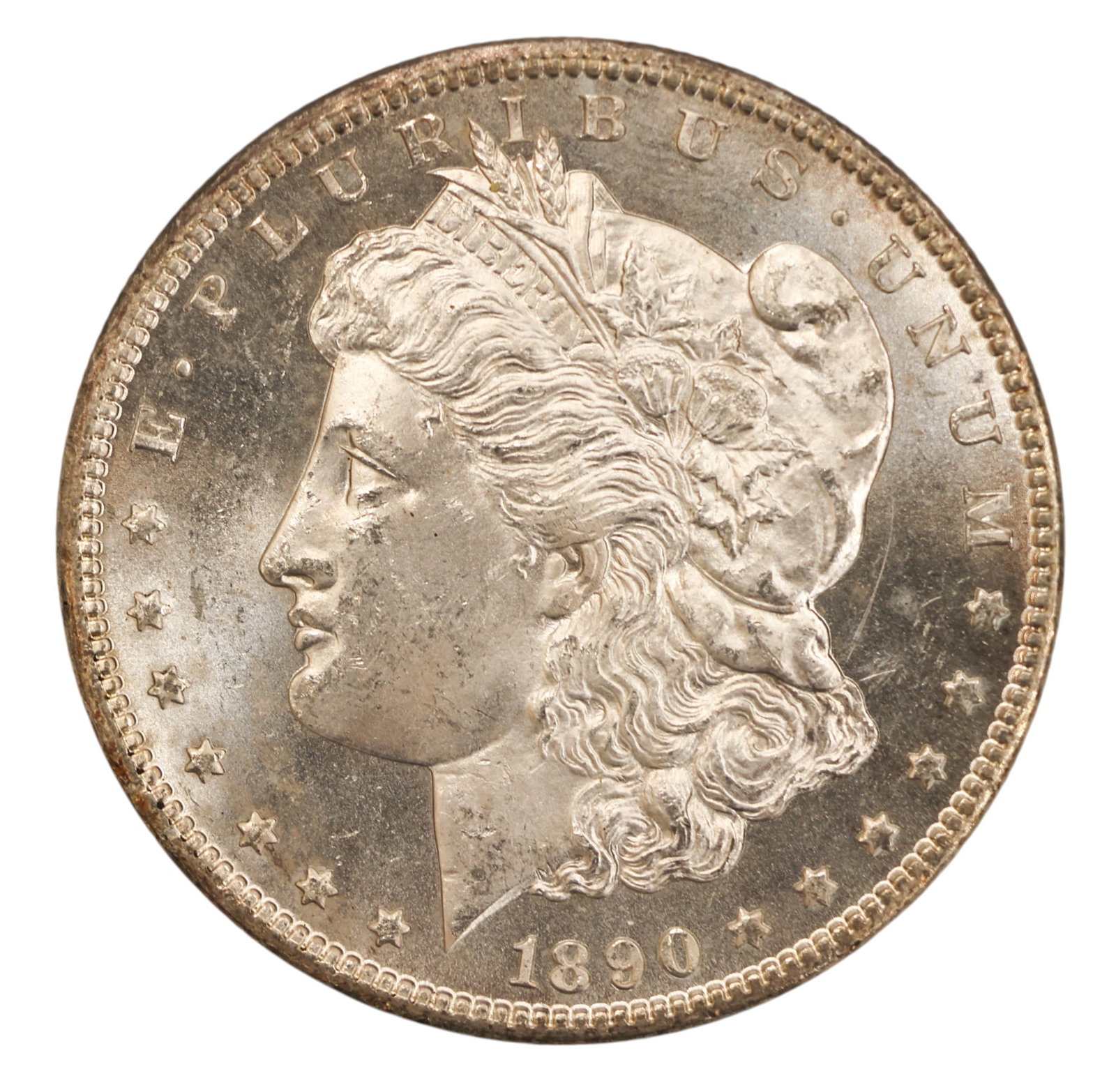 1890-CC US Morgan Silver Dollar Carson City: 1890-CC US Morgan Silver Dollar Carson City. MS-63 condition per consignor notes.