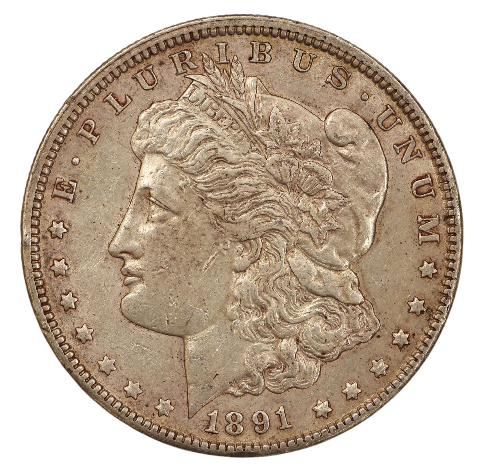 1891-CC US Morgan Silver Dollar Carson City: 1891-CC US Morgan Silver Dollar Carson City. AU-50 condition per consignor notes.