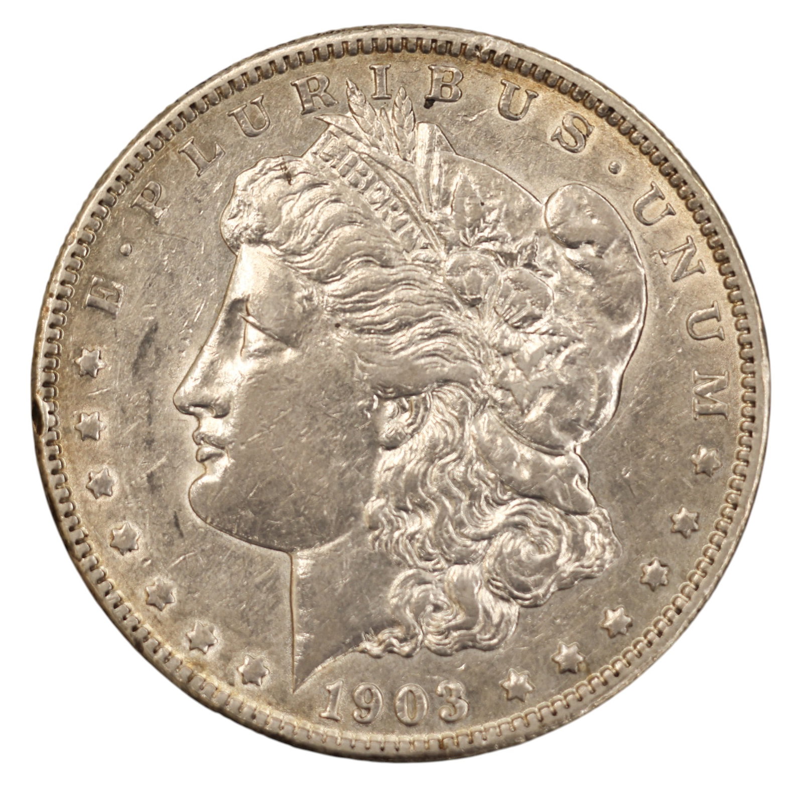 1903-O US Morgan Silver Dollar: 1903-O US Morgan Silver Dollar. MS-60 condition per consignor notes.