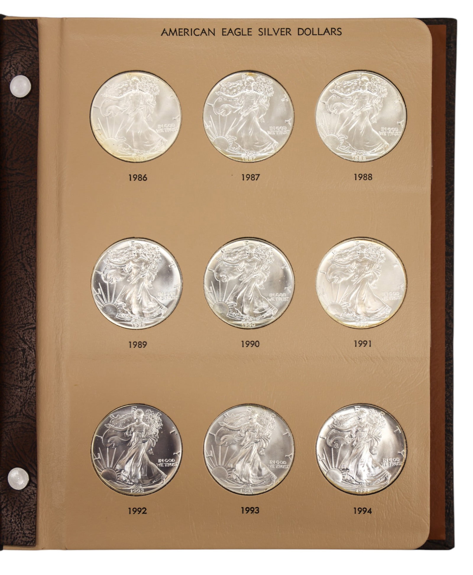 26pc US American Eagle 1oz Silver Dollars in Album: 26pc US American Eagle 1oz Silver Dollars in Album. Includes 1986-2002, 2004-2005, and 2007-2013.