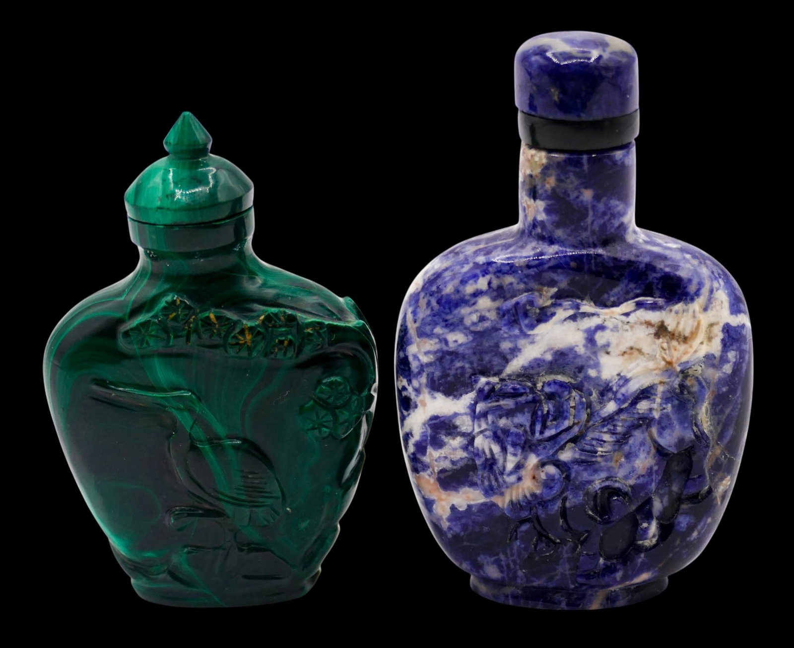 2pc Old Chinese Lapis and Malachite Snuff Bottles: 2pc Old Chinese Lapis and Malachite Snuff Bottles 2.5" to 2.75". Lapis has relief carved coin and foo lion motif while malachite has cranes. Overall excellent condition. 20th century.