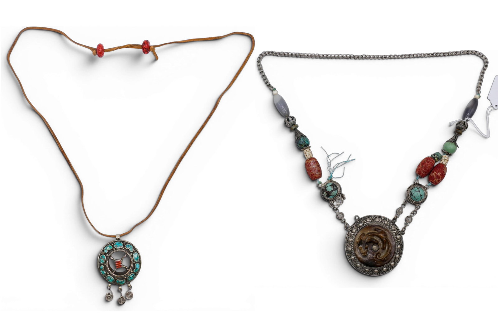 2pc Old Chinese or Tibetan Pendant Necklaces: 2pc Old Chinese or Tibetan Pendant Necklaces. Set with turquoise, stone and coral beads. Pendants measure 3" and one has a chilong bi disc. One strand is missing some beads and links. Overall excellen