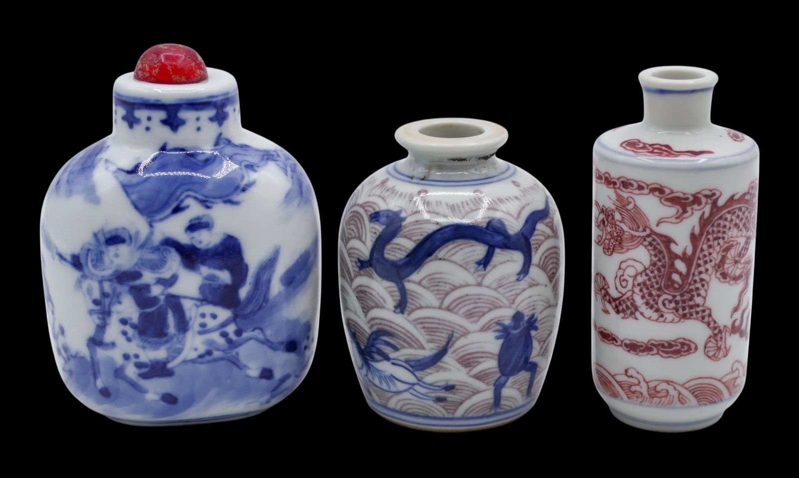 3pc Chinese Blue and Copper Red Porcelain Snuff Bottles: 3pc Chinese Blue and Copper Red Porcelain Snuff Bottles 2.5" to 3". Includes a dragon bottle, fish and figure bottle, and warriors on horseback. Two have blue underglaze dynasty marks. Excellent
