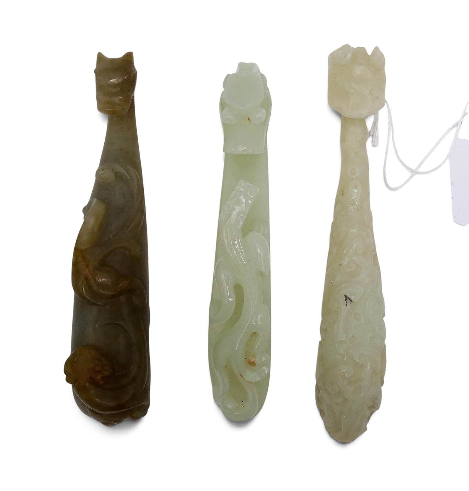 3pc Old Chinese Jade Dragon Belt Hooks: 3pc Old Chinese Jade Dragon Belt Hooks 4" to 4.5". Three assorted hooks with carved chilongs and lingzhi. Overall excellent condition.