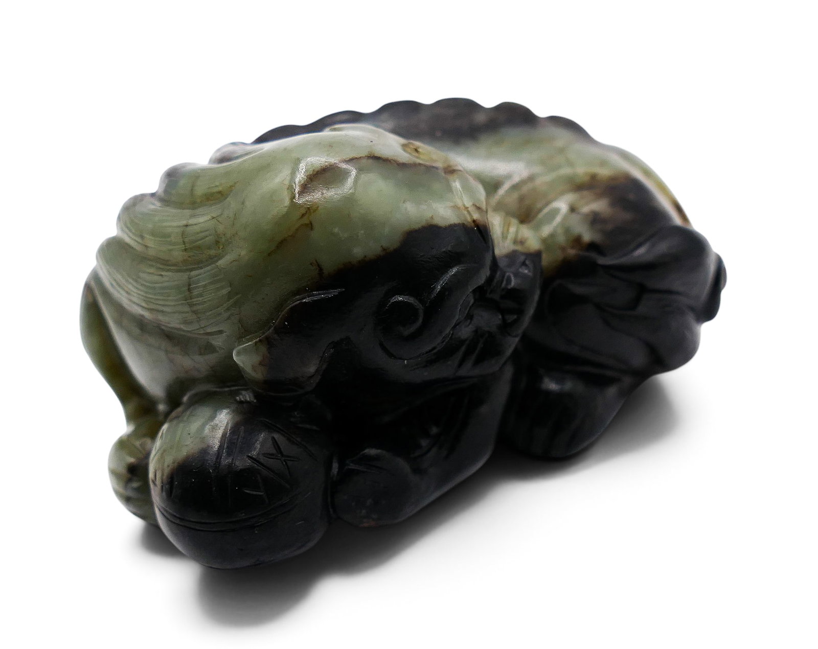 Old Chinese Jade Recumbent Foo Lion with Ball: Old Chinese Jade Recumbent Foo Lion with Ball 1.5"x3". Black with celadon coloring. Overall excellent condition.