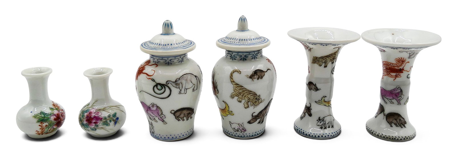 3 Pairs Chinese Porcelain Miniature Vases and Jars: 3 Pairs Chinese Porcelain Miniature Vases and Jars 1.5" to 2.75". Includes a pair of horse beaker vases, dragon and animal jars, and peony vases. Red enameled marks on bottom. Excellent condition, exa