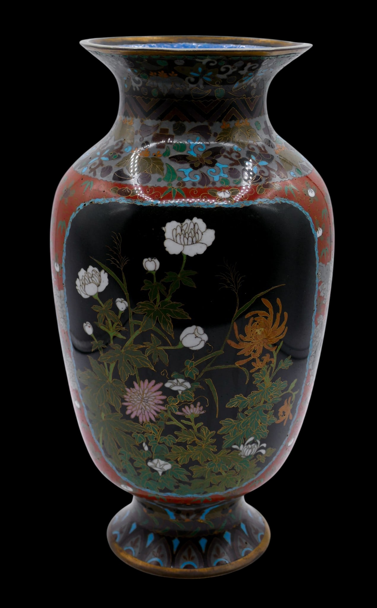 Antique Japanese Cloisonne Blossoming Flowers Vase: Antique Japanese Cloisonne Blossoming Flowers Vase 11"x6". Polychrome enameled with various blossoming flowers and mythological beast medallions. Unmarked. One slight dent to edge of top rim. Overall 