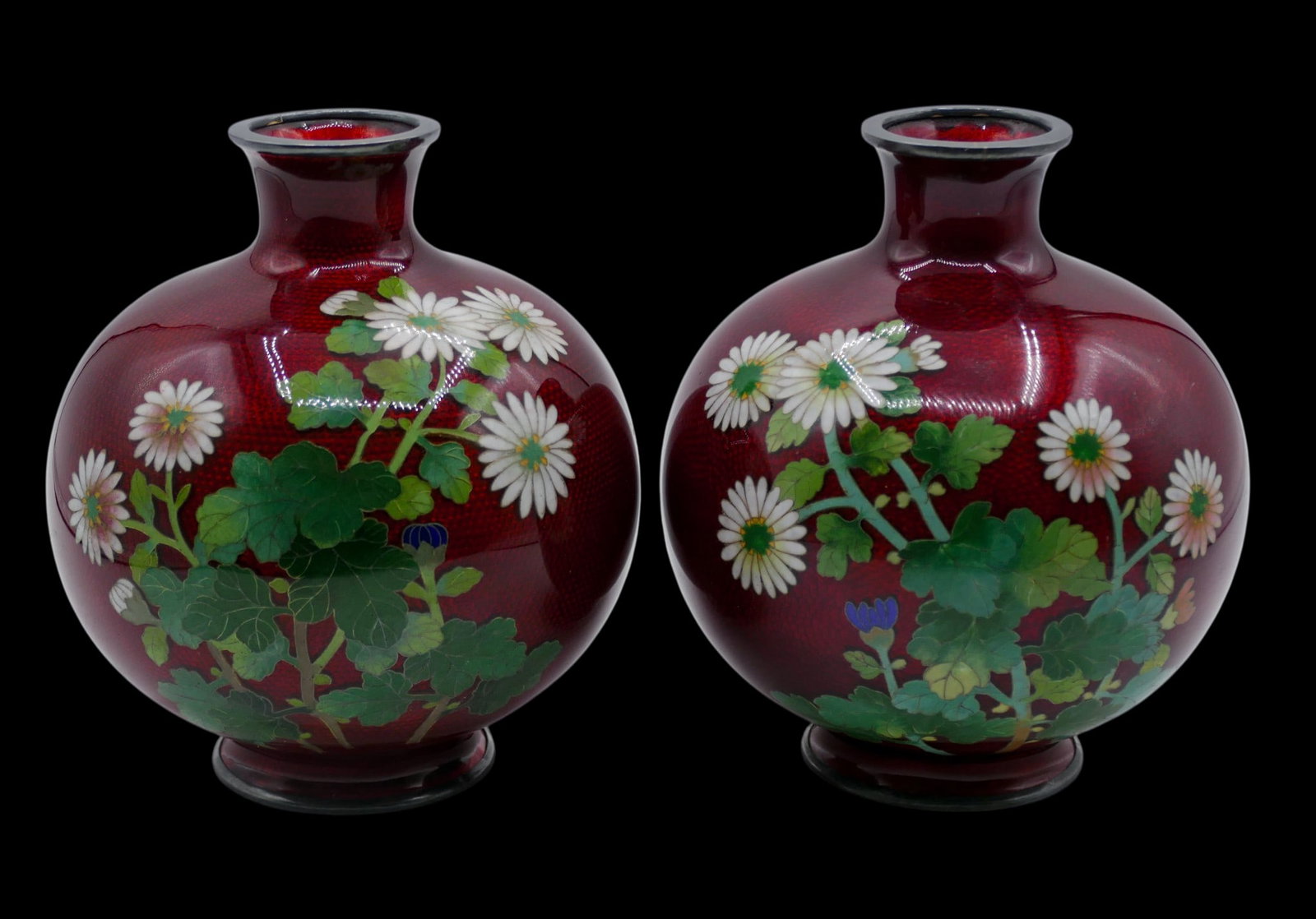 Pair Japanese Katayama Pigeon Blood Silver Cloisonne Vases: Pair Japanese Katayama Pigeon Blood Silver Cloisonne Vases 5.5"x5". Polychrome enameled with blossoming flowers. Marked Katayama Co. with the CPO mark. Sterling silver bodies (tested). Overall