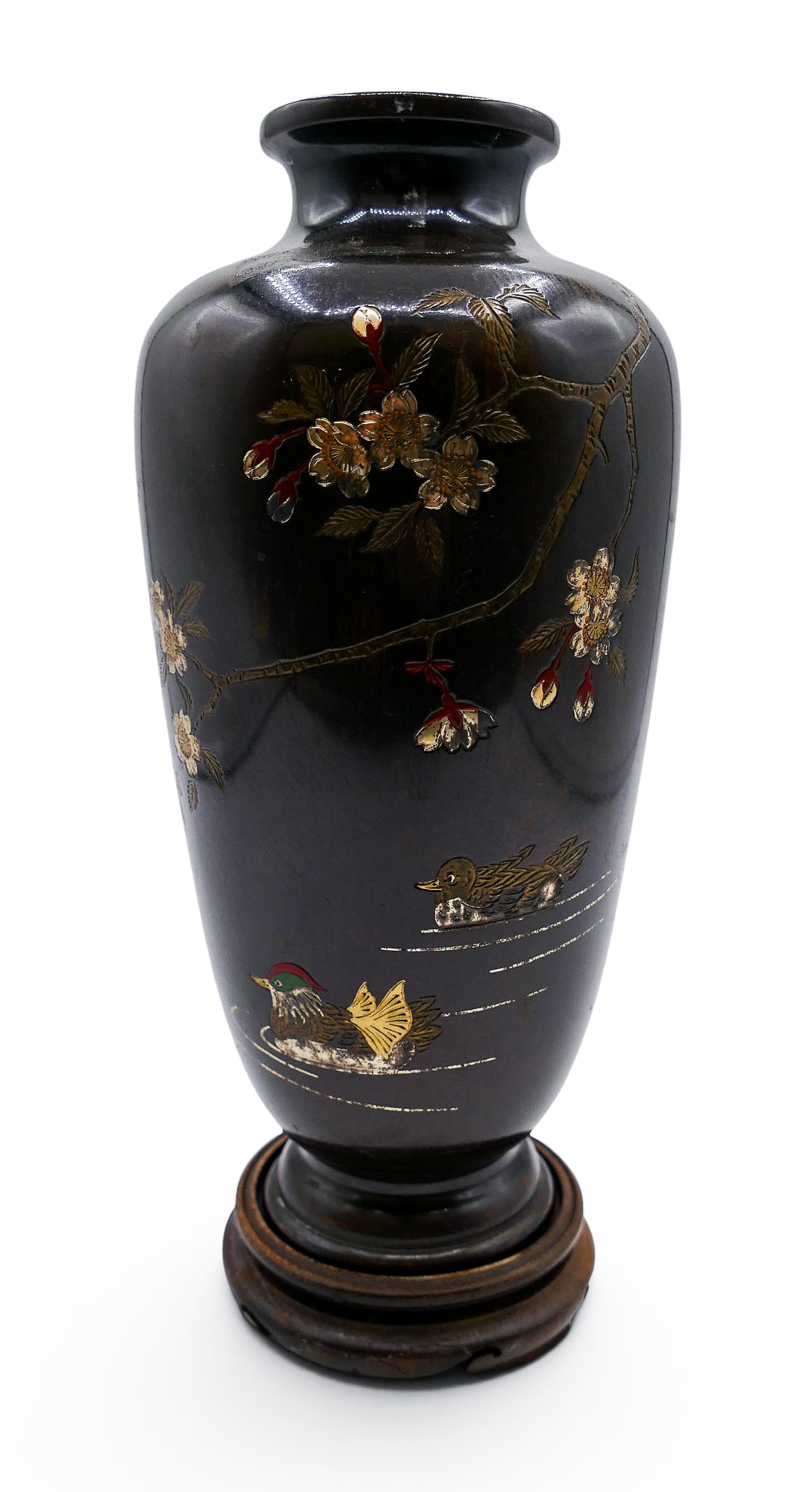 Old Japanese Lacquered Bronze Vase on Stand: Old Japanese Lacquered Bronze Vase on Stand 8.5"x3.5". Silver and red lacquer blossoming prunus flower and mandarin duck motifs. Carved fitted wood stand. Signed on side with two characters. Overall