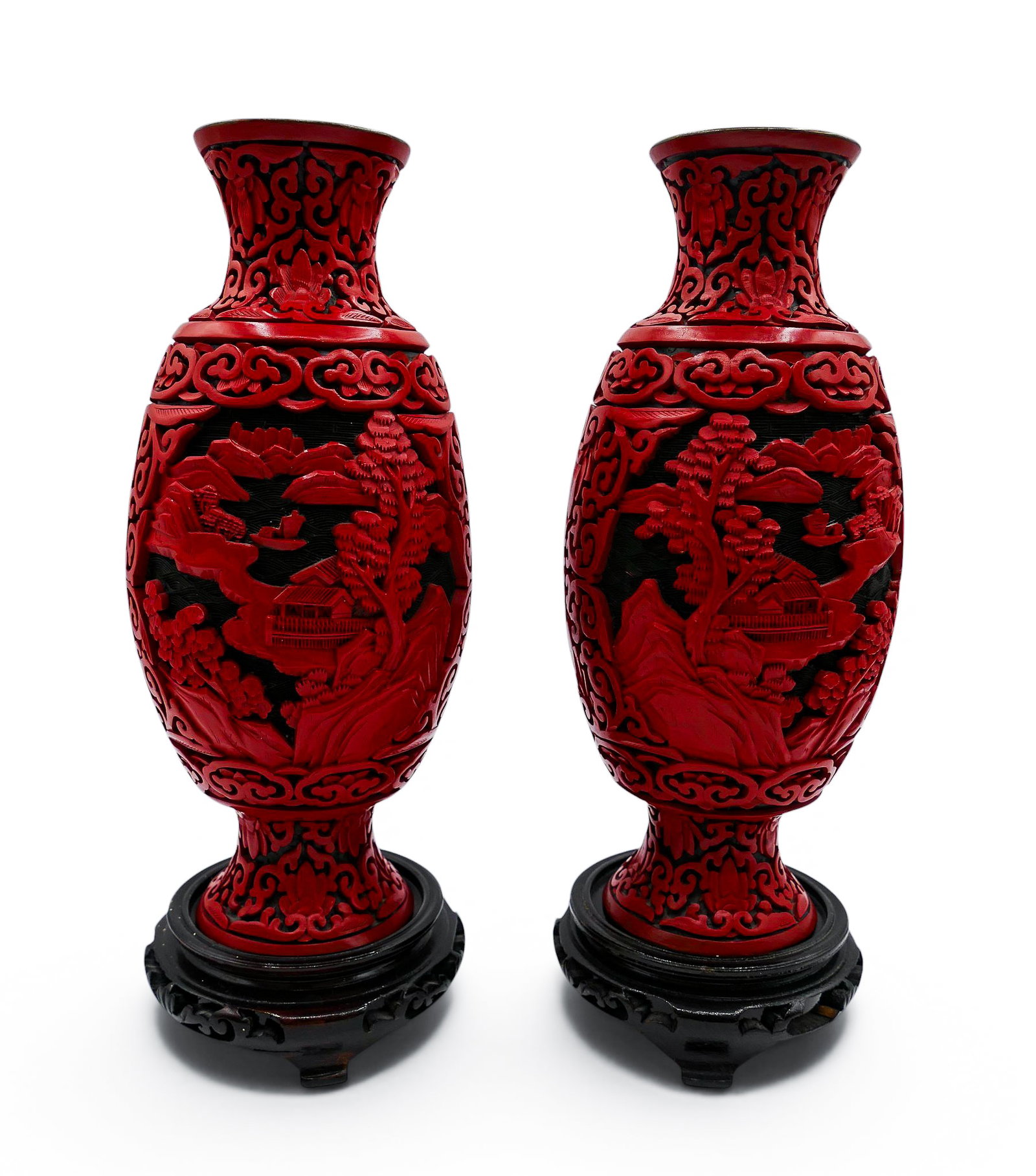 Pair Chinese Two-Color Cinnabar Vases on Stands: Pair Chinese Two-Color Cinnabar Vases on Stands 10.5". Carved with mountainous landscape motifs. Wood stands included. Excellent condition.