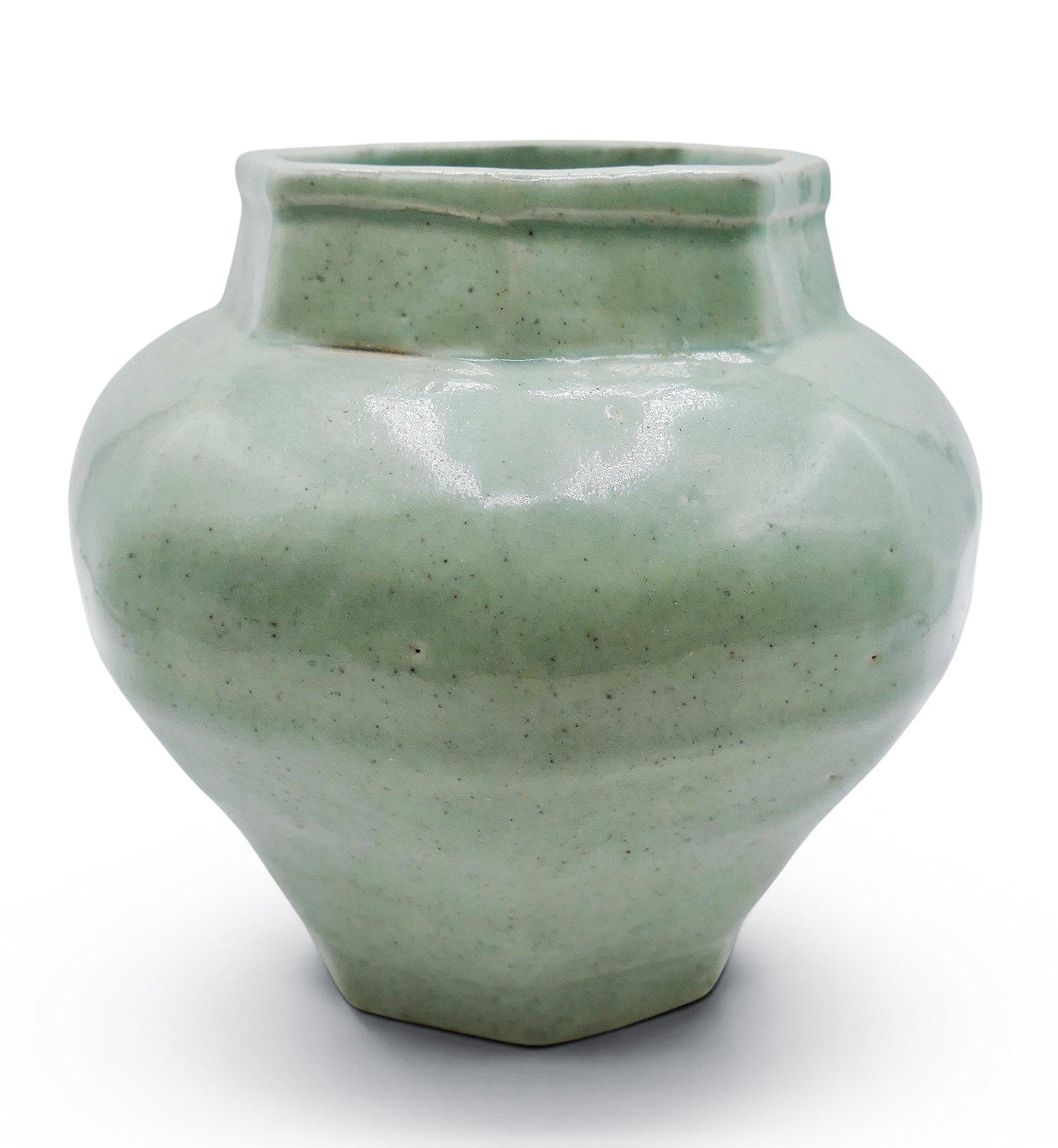 Old Chinese Celadon Glazed Blue and White Decorated Jar: Old Chinese Celadon Glazed Blue and White Decorated Jar 5.75"x6". Unusual octagonal form with blue underglaze immortals decorated on interior. Blue underglaze seal mark on bottom. Excellent condition.