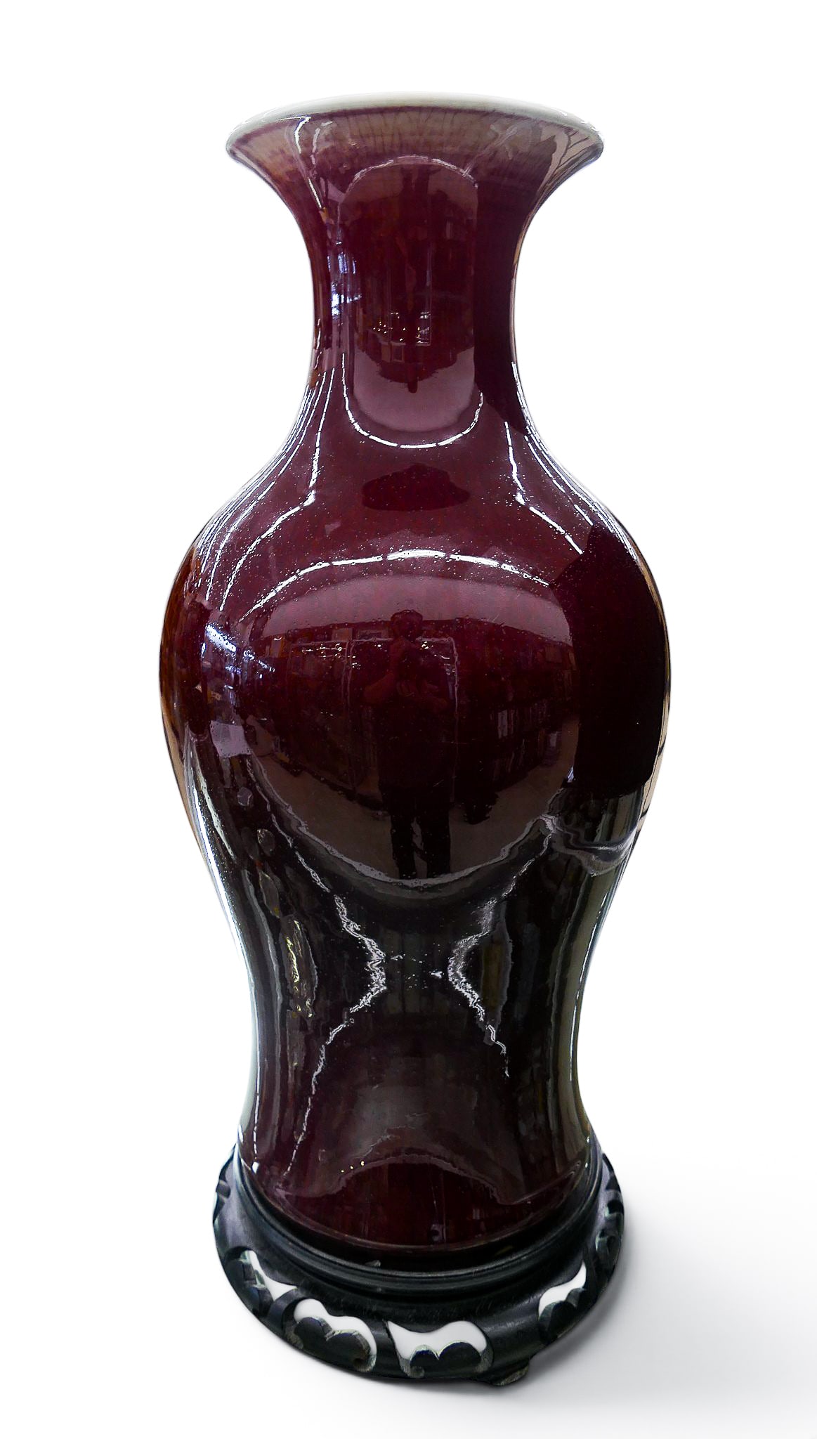 Antique Chinese Langyao Oxblood Porcelain Vase: Antique Chinese Langyao Oxblood Porcelain Vase 16.5"x7.5". Deep sang de boeuf oxblood glazes. Unmarked. Comes with carved rosewood stand. Some kiln chipping to bottom of foot, original to its