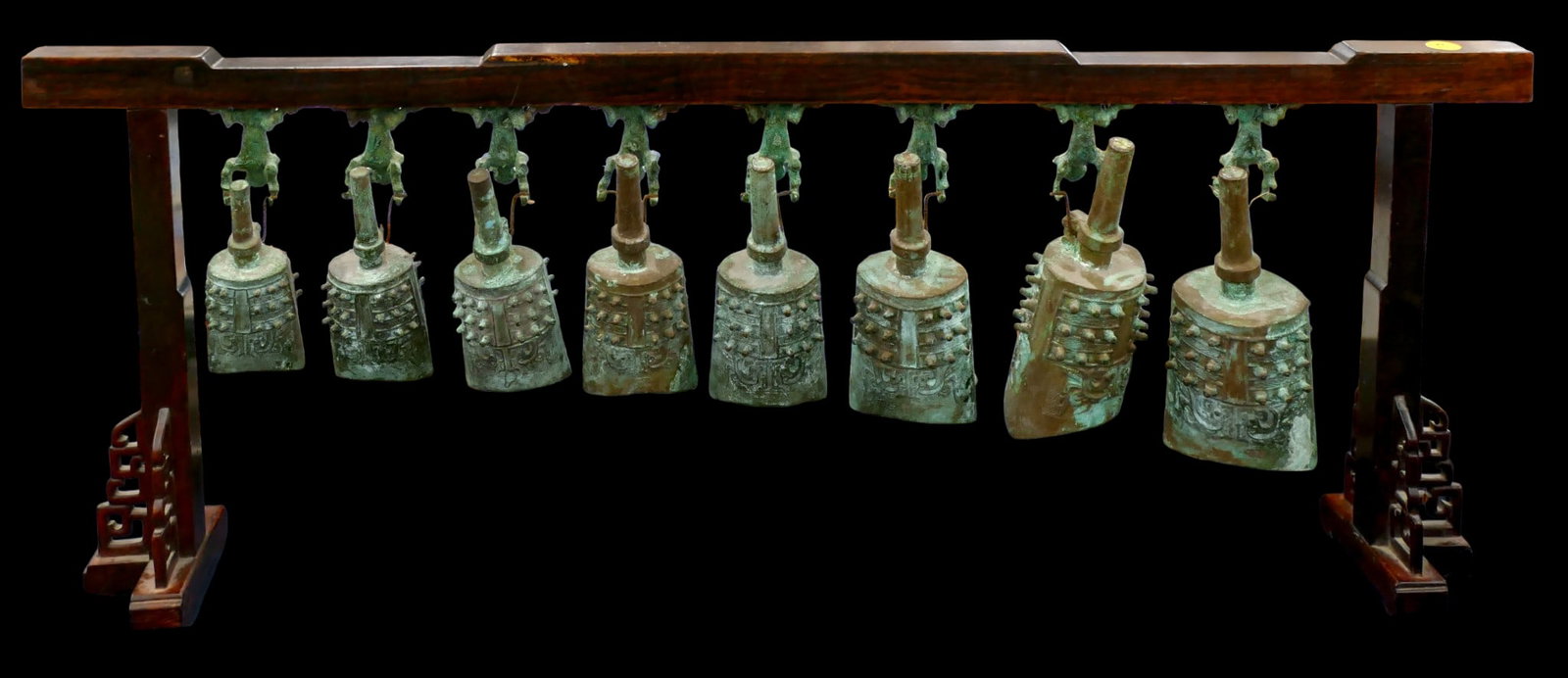 Old Chinese Archaic Bronze Table Bell Set on Rosewood Stand: Old Chinese Archaic Bronze Table Bell Set on Rosewood Stand 13"x35". Some replaced metal hangers on bells. Overall exellent condition.