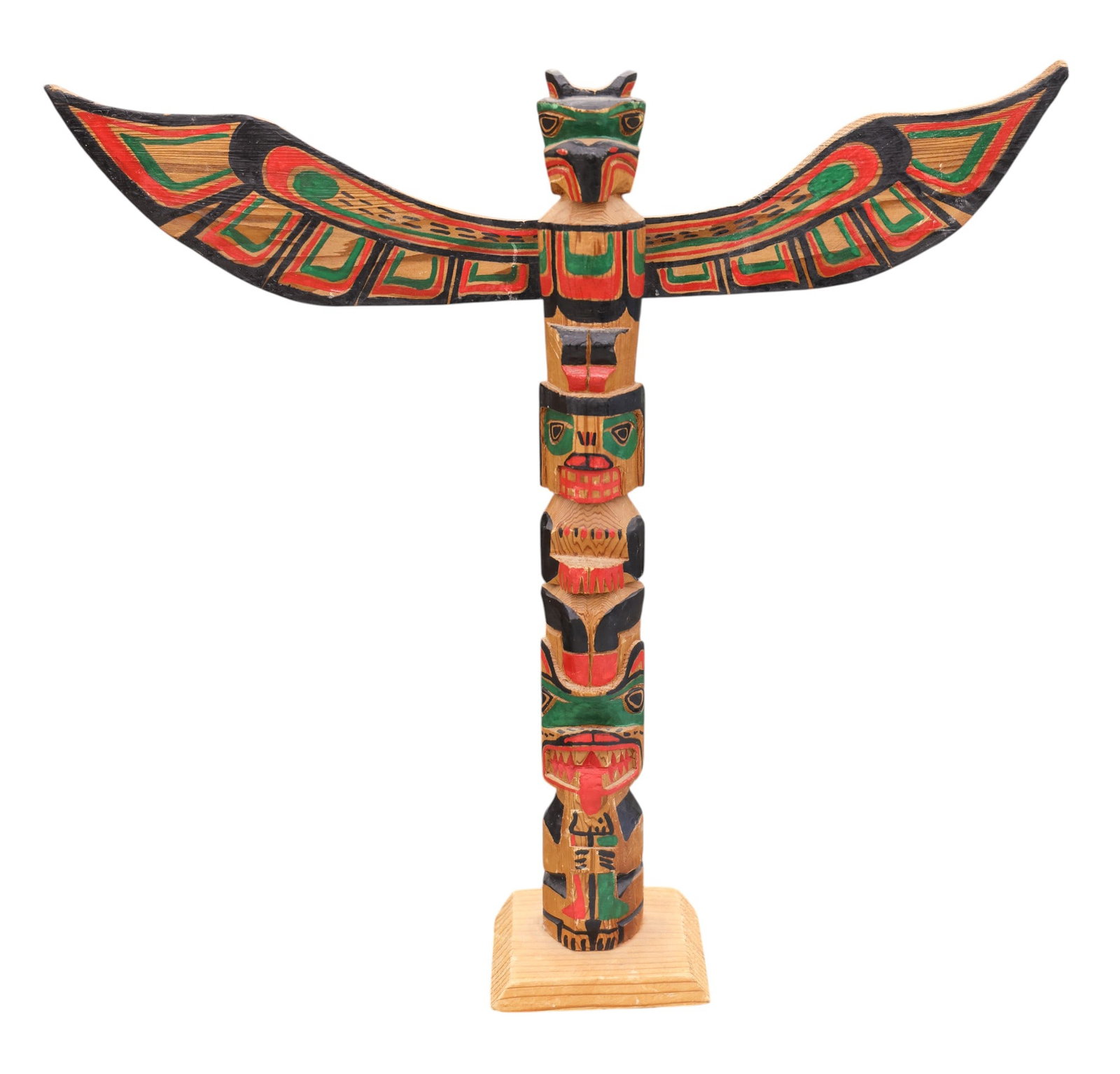 Old Barbara Foley Kwakiutl Thunderbird Cedar Totem Pole Model: Barbara Foley (20/21st Cent. Kwakiutl) Thunderbird Cedar Totem Pole Model 16"x17". Polychrome painted and carved. Signed on underside. Overall excellent condition for its age.