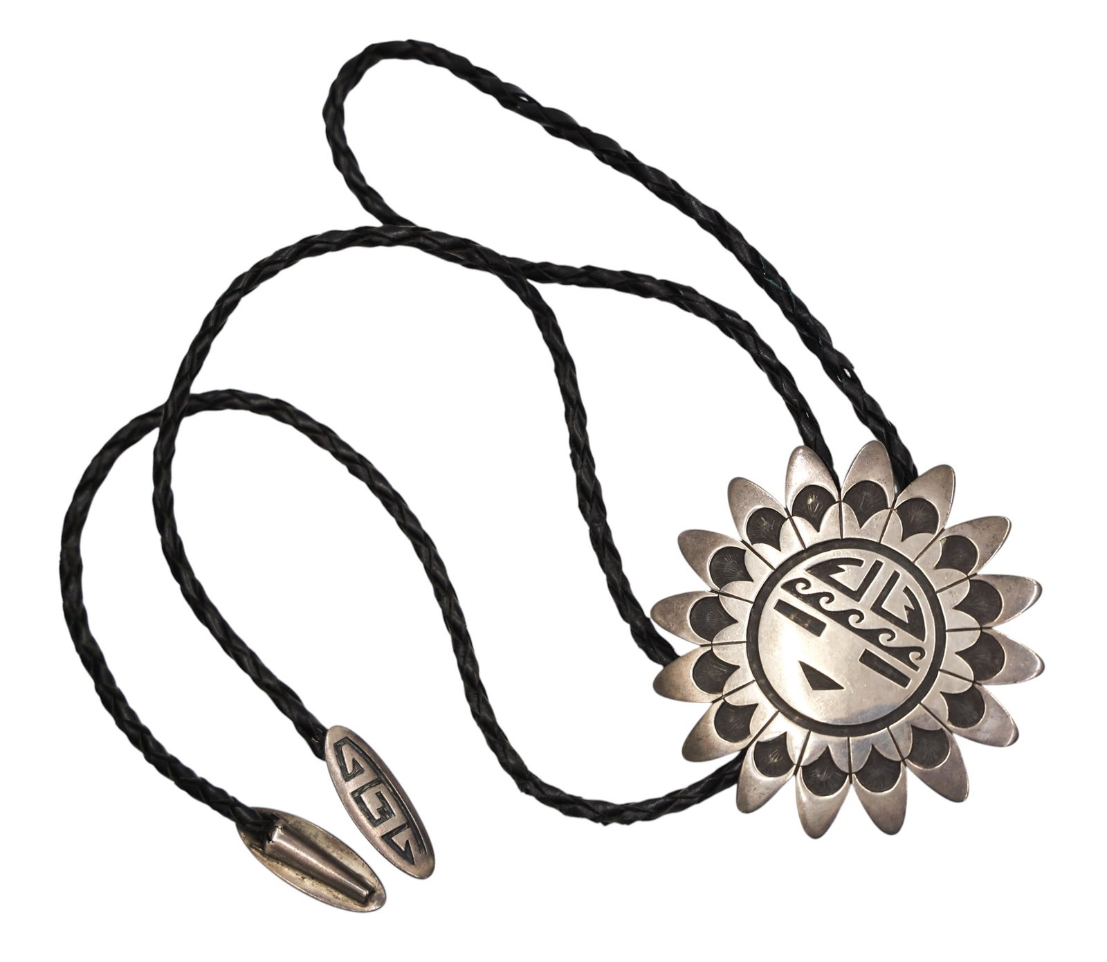 Billy Rae Hawee Hopi Sterling Sun Face Bolo Tie: Billy Rae Hawee Hopi Sterling Sun Face Bolo Tie 40". It has a 3" figural sun bolo slide. Maker's cipher on verso. It weighs 65 grams total. Excellent condition.