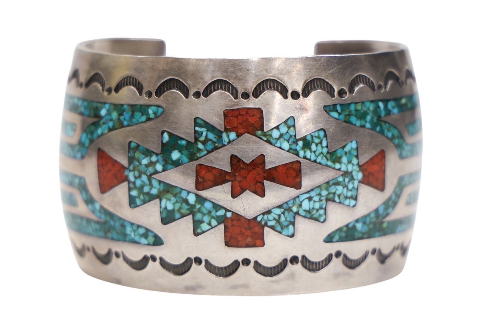 Old Zuni Inlaid Silver Turquoise and Coral Cuff Bracelet: Old Zuni Inlaid Silver Turquoise and Coral Cuff Bracelet Fits 6.75" Wrist. Thick bracelet measuring 1.5". Signed "STC" on verso. It weighs 74 grams. Overall excellent condition.