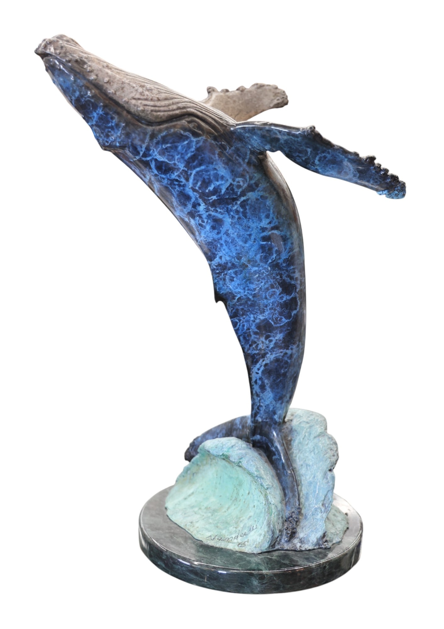 Phil Vanderlei "Breaching" (Humpback Whale) Bronze Sculpture: Phil Vanderlei (20th Cent. American) "Breaching" (Humpback Whale) Bronze Sculpture 16"x11". Signed and numbered 65 of 100 edition. Excellent condition. It weighs 13 pounds.