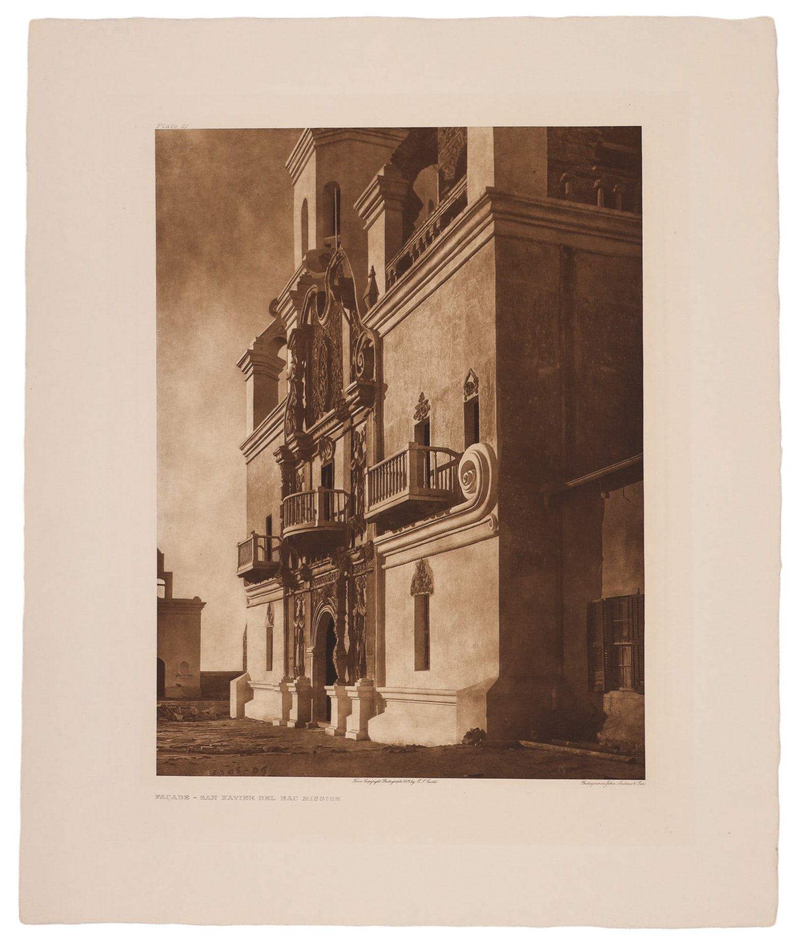 Edward Curtis "Facade - San Xavier Del Bac Mission" 1907 Photogravure: Edward Curtis "Facade - San Xavier Del Bac Mission" (Plate 51) 1907 Photogravure 21.75"x18" Sheet. Overall excellent condition. Loose, unframed.