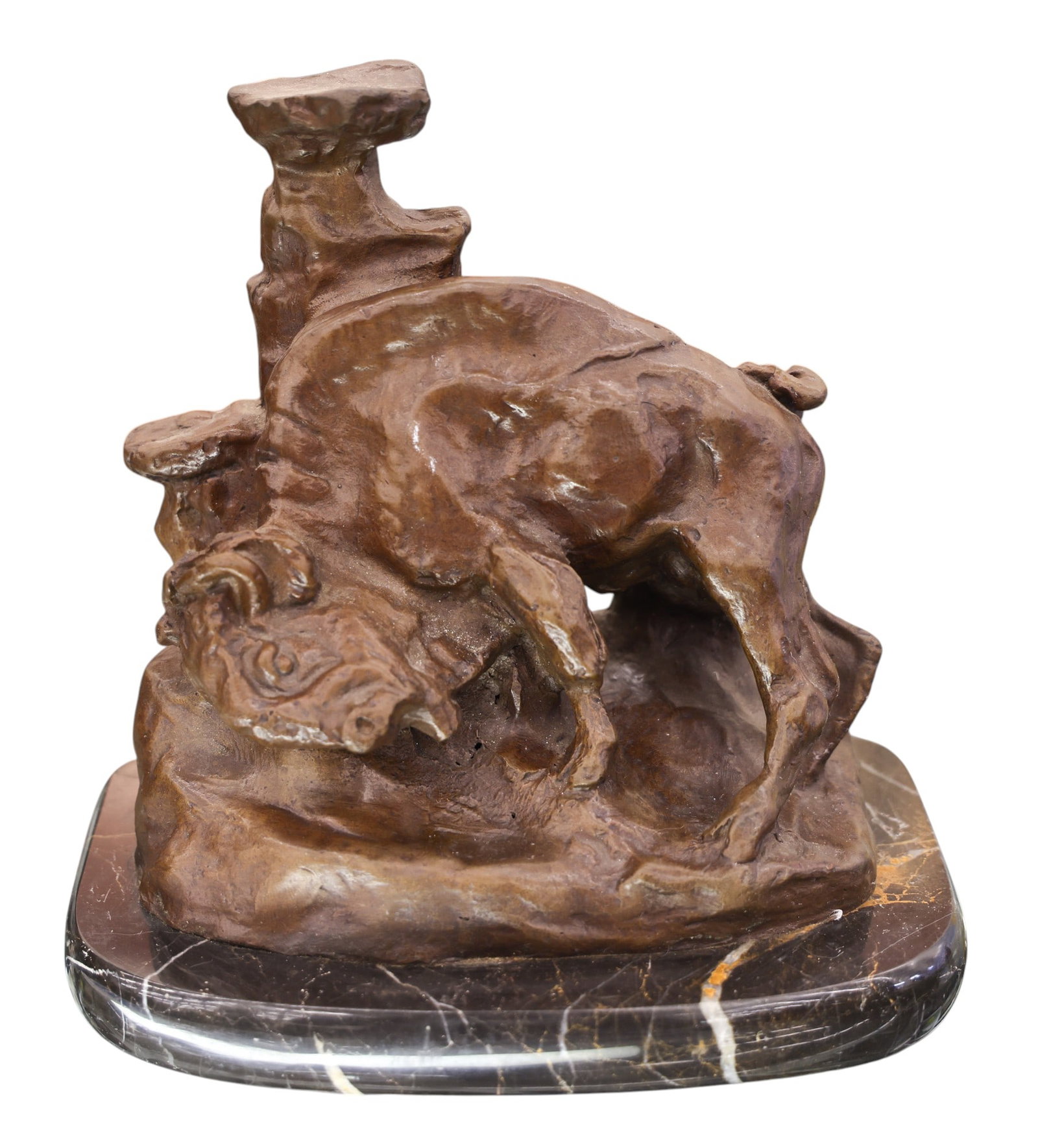 After Charles Russell "Buffalo Rubbing Rock" Bronze Sculpture: After Charles Russell "Buffalo Rubbing Rock" Bronze Sculpture 7.5"x7.5". Signed on verso. Posthumous casting. Excellent condition. It weighs 10.5 pounds.