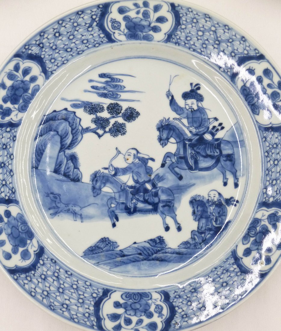 Set of (8) Chinese Kangxi Blue & White Warrior on: Set of (8) Chinese Kangxi Blue & White Warrior on Horseback Plates 9'' Diameter. Each bears a conch shell mark. Each has very minor edge glaze chipping.
