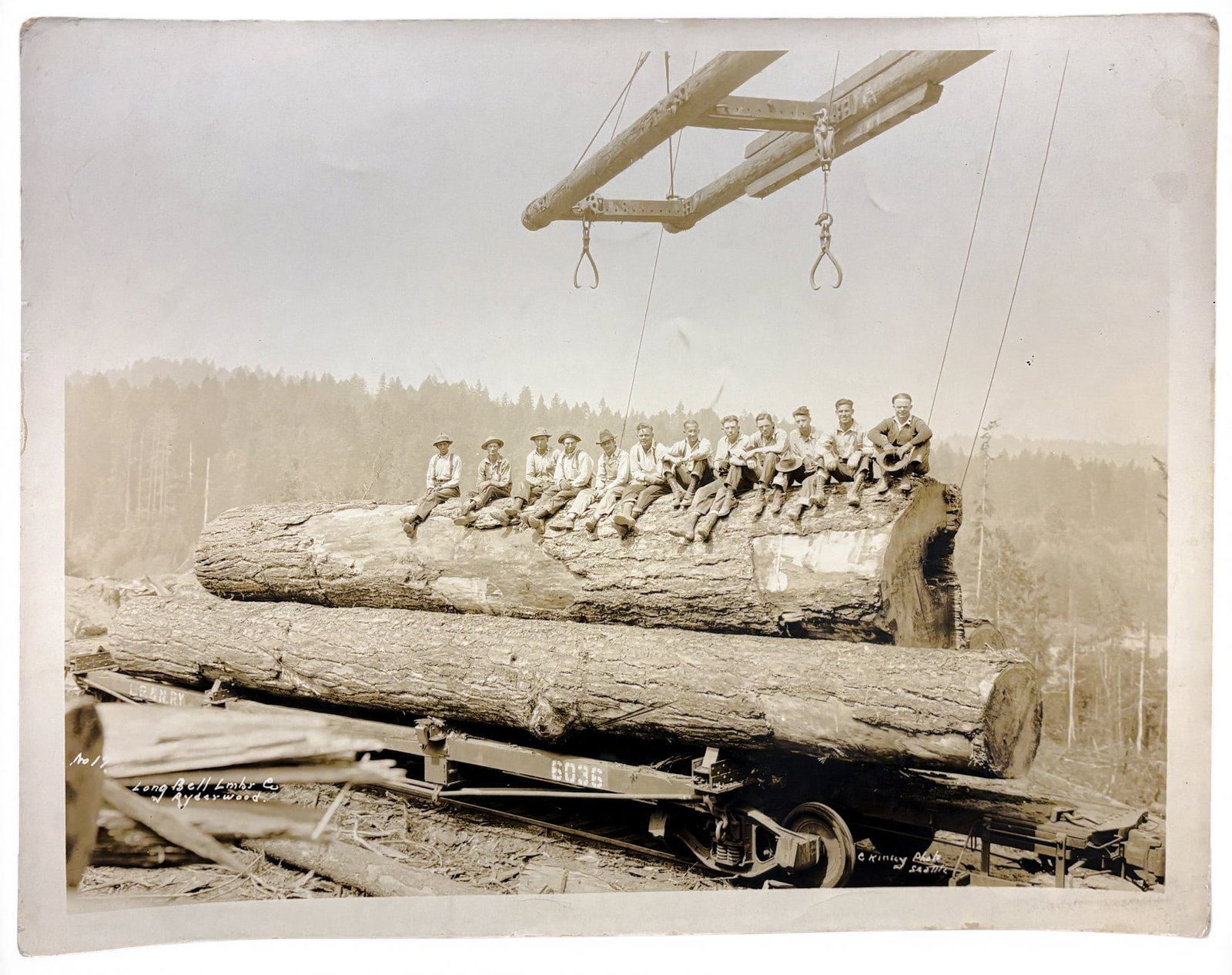 Clark Kinsey "Long Bell Lmbr Co. Ryderwood" Photograph: Clark Kinsey (1877-1956 Washington) "Long Bell Lmbr Co. Ryderwood" Photograph 11"x14" Sheet. Loose, unframed. Signed lower right and numbered 17. Minor creasing, minor stains to upper right corner, mi