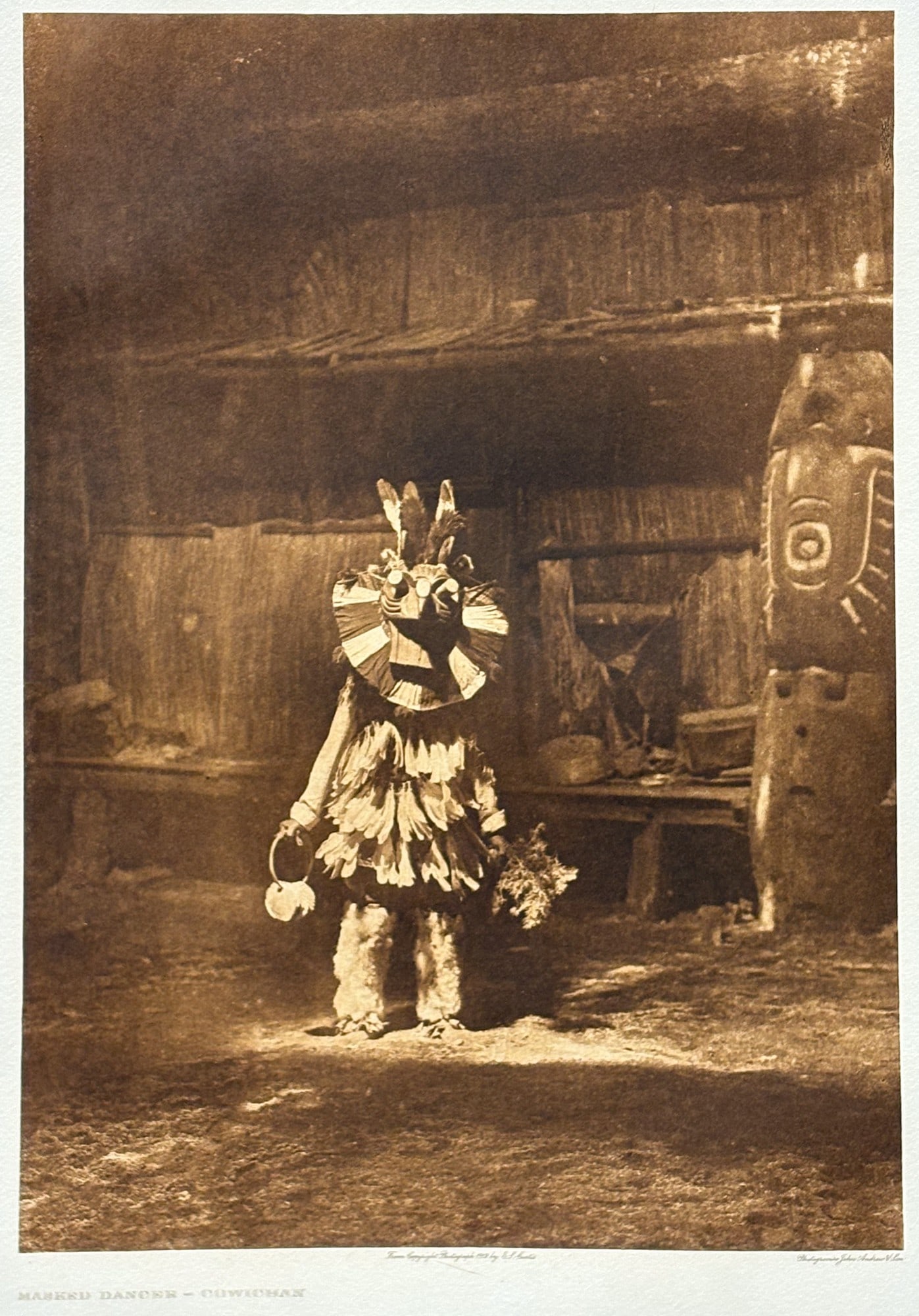 Edward Curtis "Masked Dancer - Cowichan" 1912 Photogravure: Edward Curtis (1868-1952 American) "Masked Dancer - Cowichan" 1912 Photogravure 23.5"x19" Sheet 31"x26.5" Matted. Plate signed lower center. Overall excellent condition.