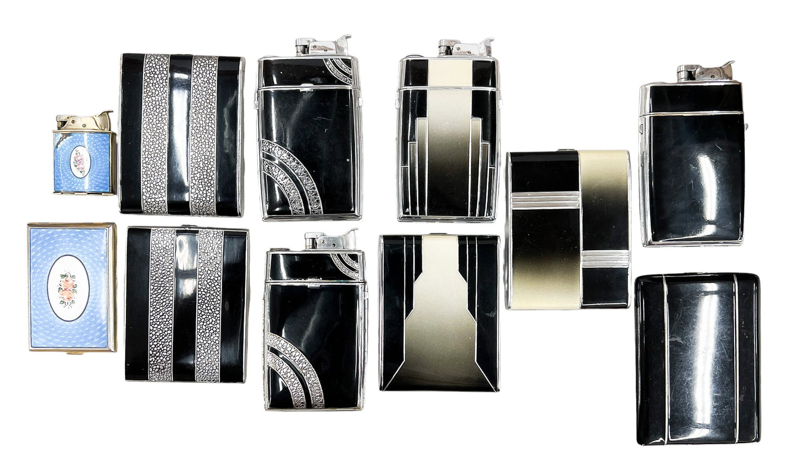 11pc Lighters, Cigarette Cases & Case Lighters: 11pc Lighters, Cigarette Cases & Case Lighters 4.25" Largest. Brands include Evans & Elgin American. Condition varies.