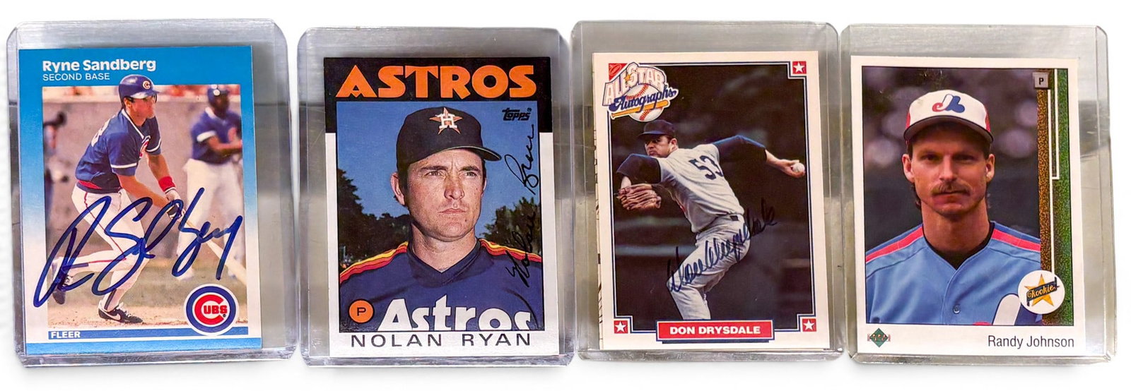 4pc Signed & Unsigned Baseball Cards: 4pc Signed & Unsigned Baseball Cards. Includes Nolan Ryan, Ryne Sandberg, Don Drysdale, & Randy Johnson. Condition varies.