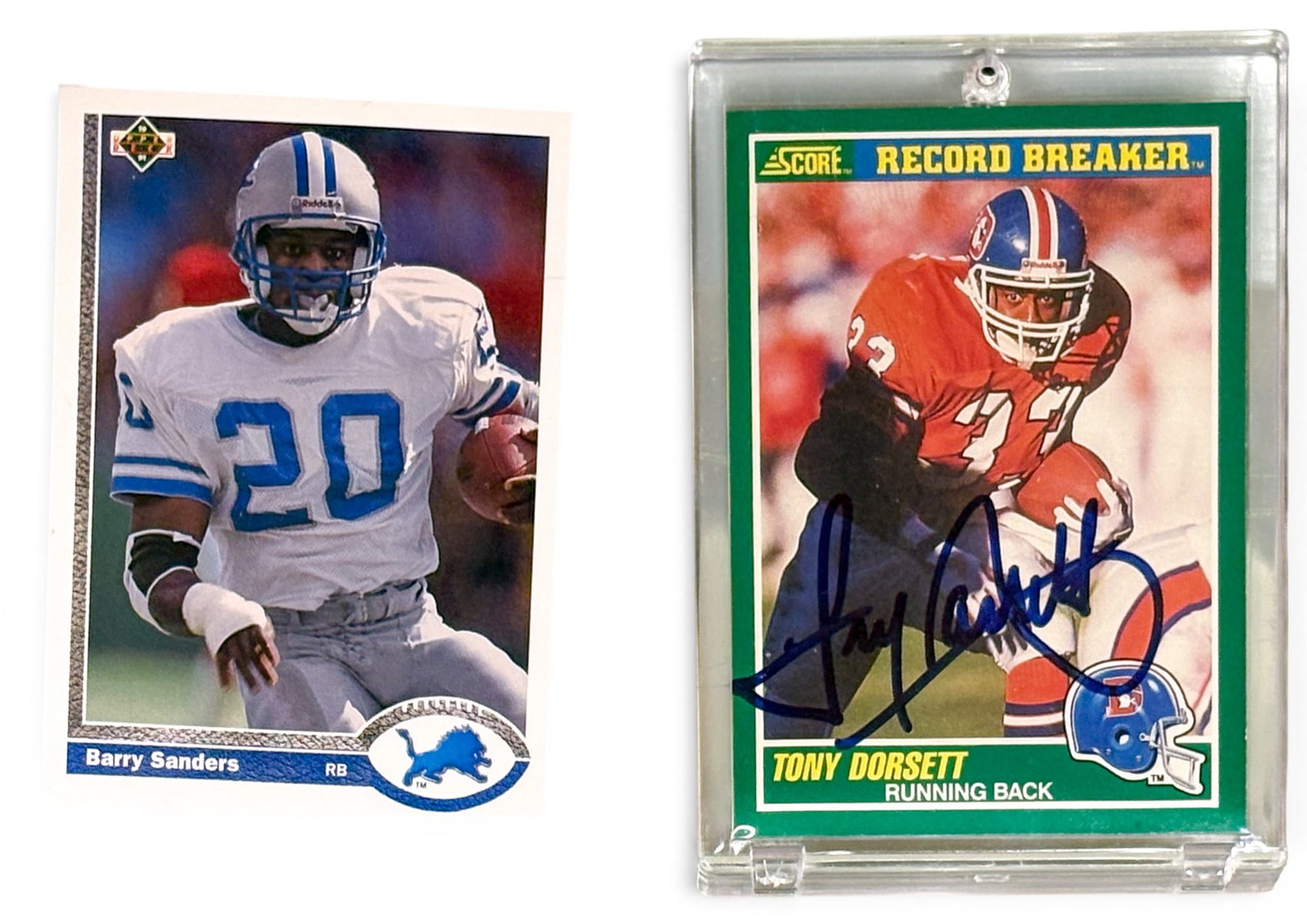 2pc Signed & Unsigned Football Cards: 2pc Signed & Unsigned Football Cards. Includes Barry Sanders & Tony Dorsett. Condition varies.