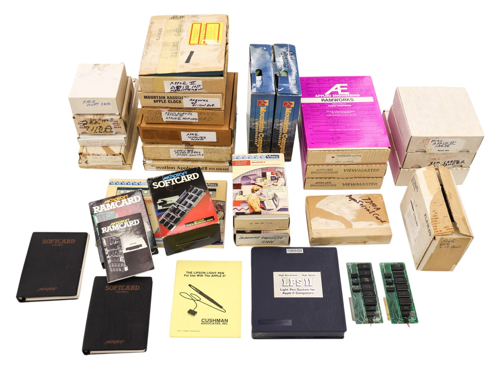 Collection of 1970's and 1980's Apple Ramcards, Cards, and Drives: Collection of 1970's and 1980's Apple Ramcards, Cards, and Drives. Includes Ramcards, Softcards, AE Ramworks, LPS II Light Pen System, etc. Boards are in boxes but untested. As-seen condition.