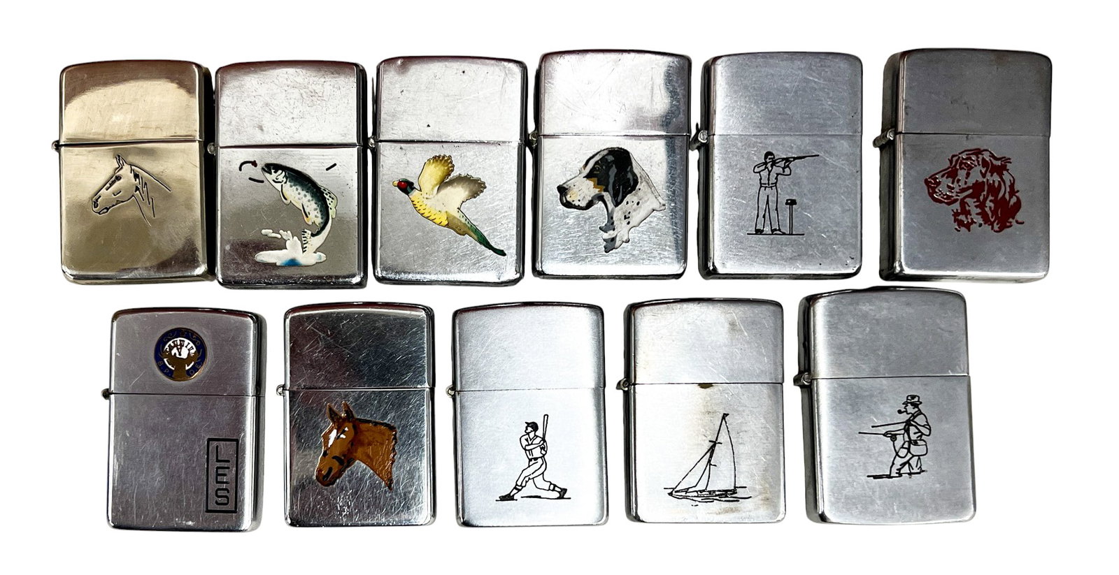 11pc Vintage Animal & Sport Zippo Lighters: 11pc Vintage Animal & Sport Zippo Lighters 2.25"x1.5" Each. One fraternal Elks Lodge.
