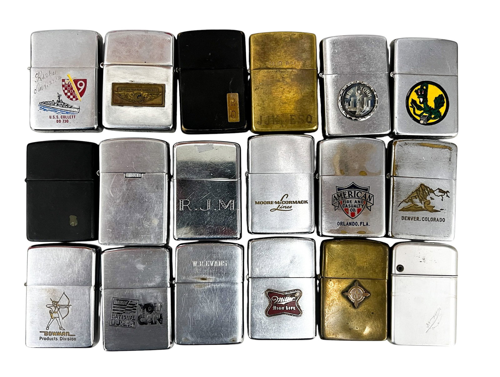 18pc Vintage Lighters: 18pc Vintage Lighters 2.25"x1.5" Each. Includes fraternal, U.S. National Guard, Army, Navy lighters. Brands include Soverign, Storm Master, Hurricane, Galelite, Supreme, Zippo.